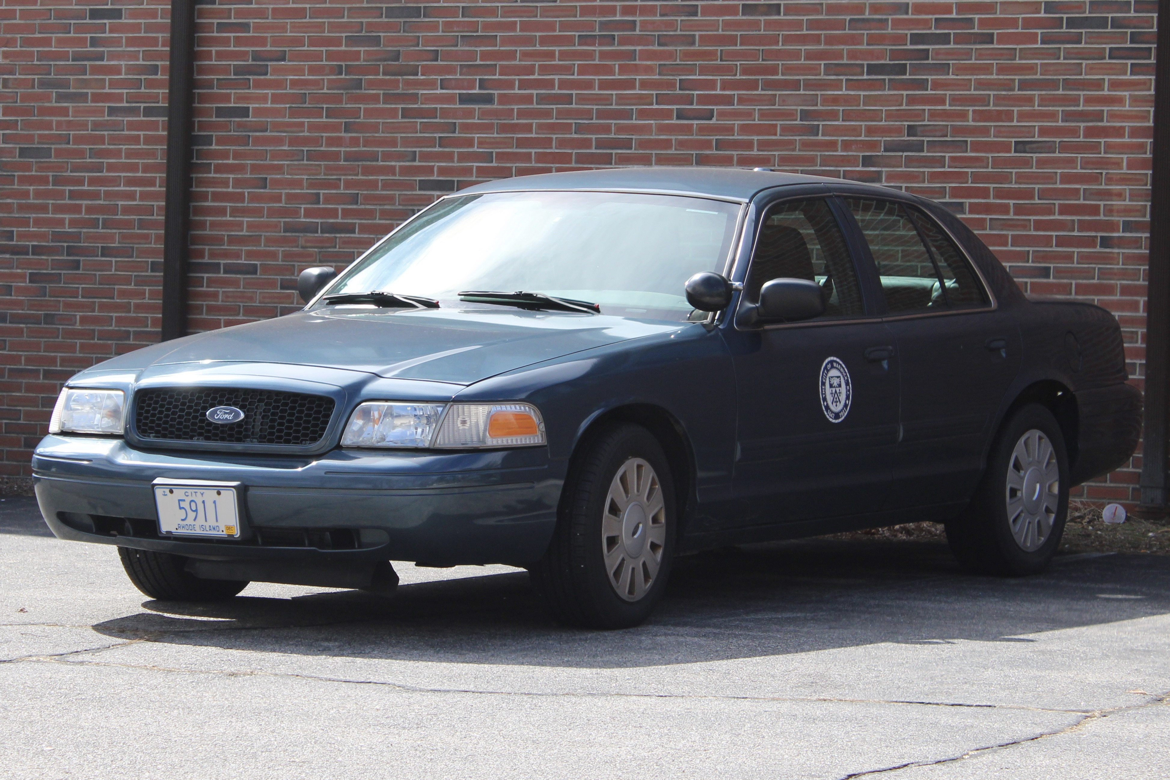A photo  of Warwick Public Works
            Car 5911, a 2009-2011 Ford Crown Victoria Police Interceptor             taken by @riemergencyvehicles