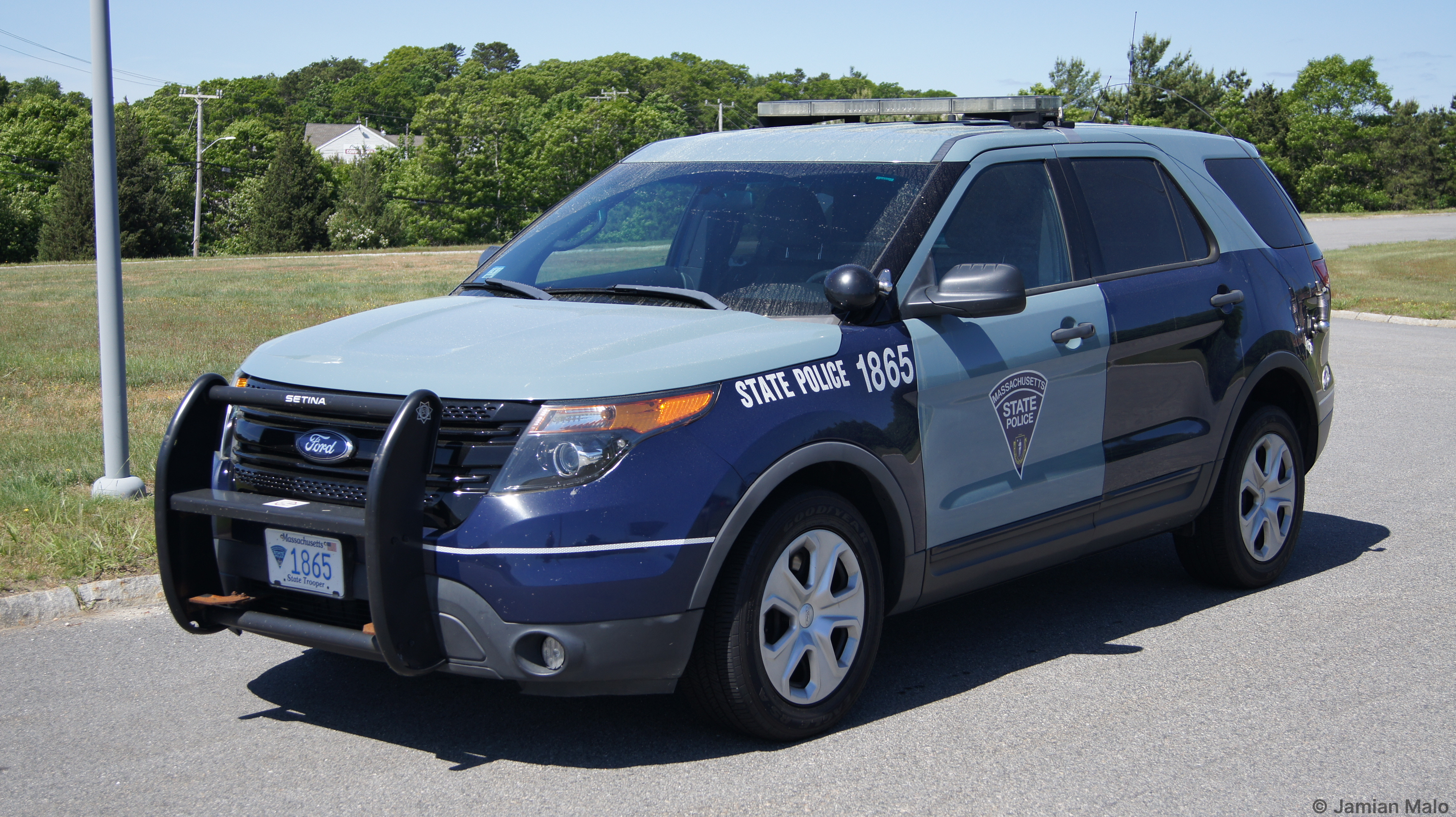 A photo  of Massachusetts State Police
            Cruiser 1865, a 2013-2014 Ford Police Interceptor Utility             taken by Jamian Malo