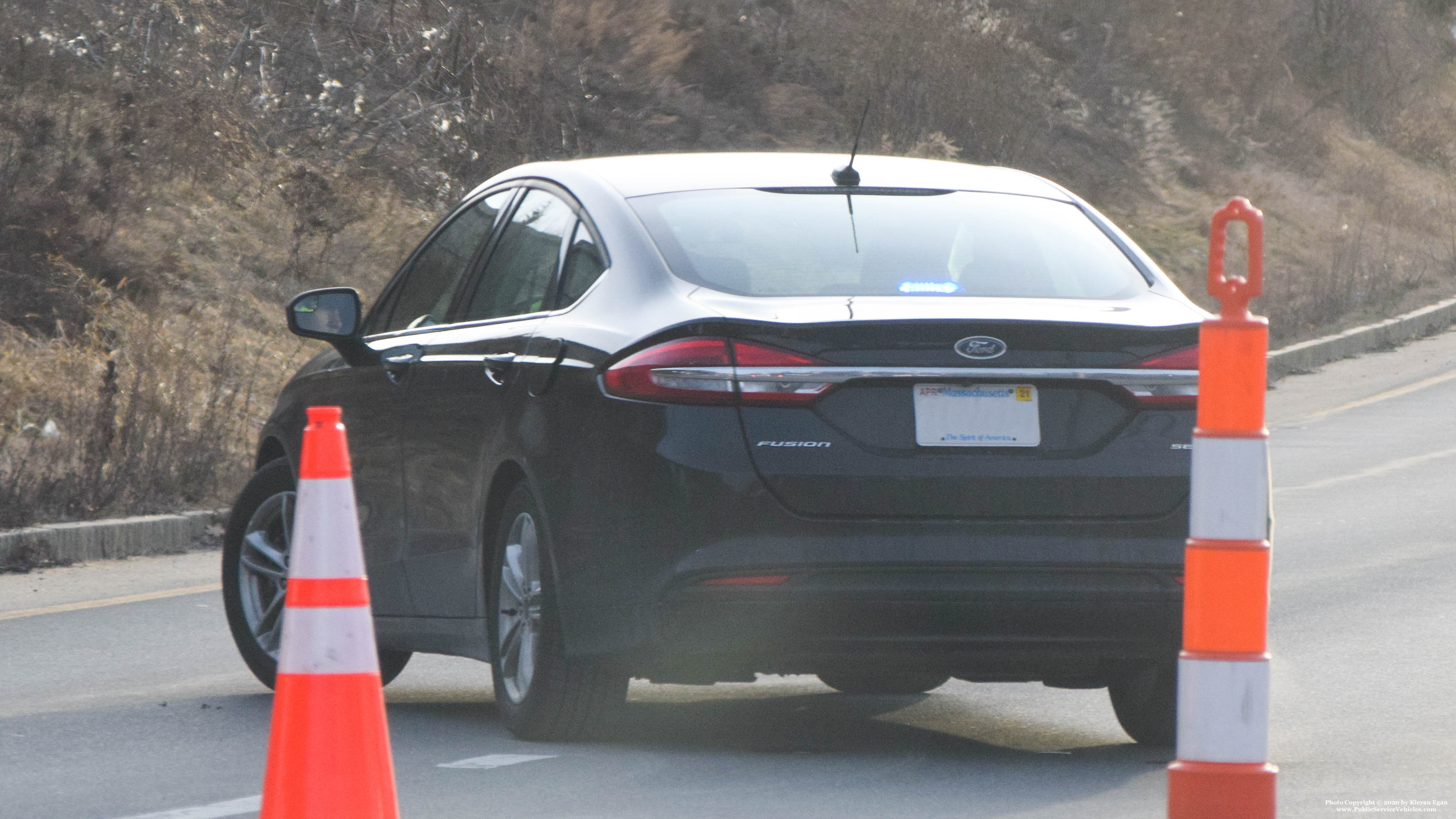 A photo  of Massachusetts State Police
            Unmarked Unit, a 2013-2019 Ford Fusion             taken by Kieran Egan