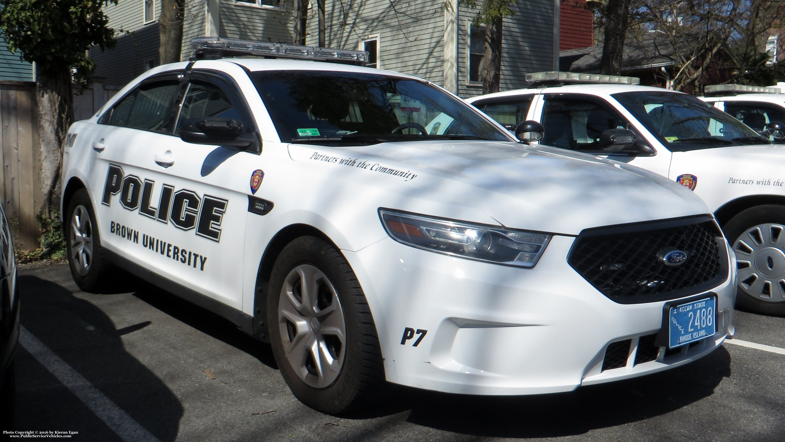 A photo  of Brown University Police
            Patrol 7, a 2014-2015 Ford Police Interceptor Sedan             taken by Kieran Egan