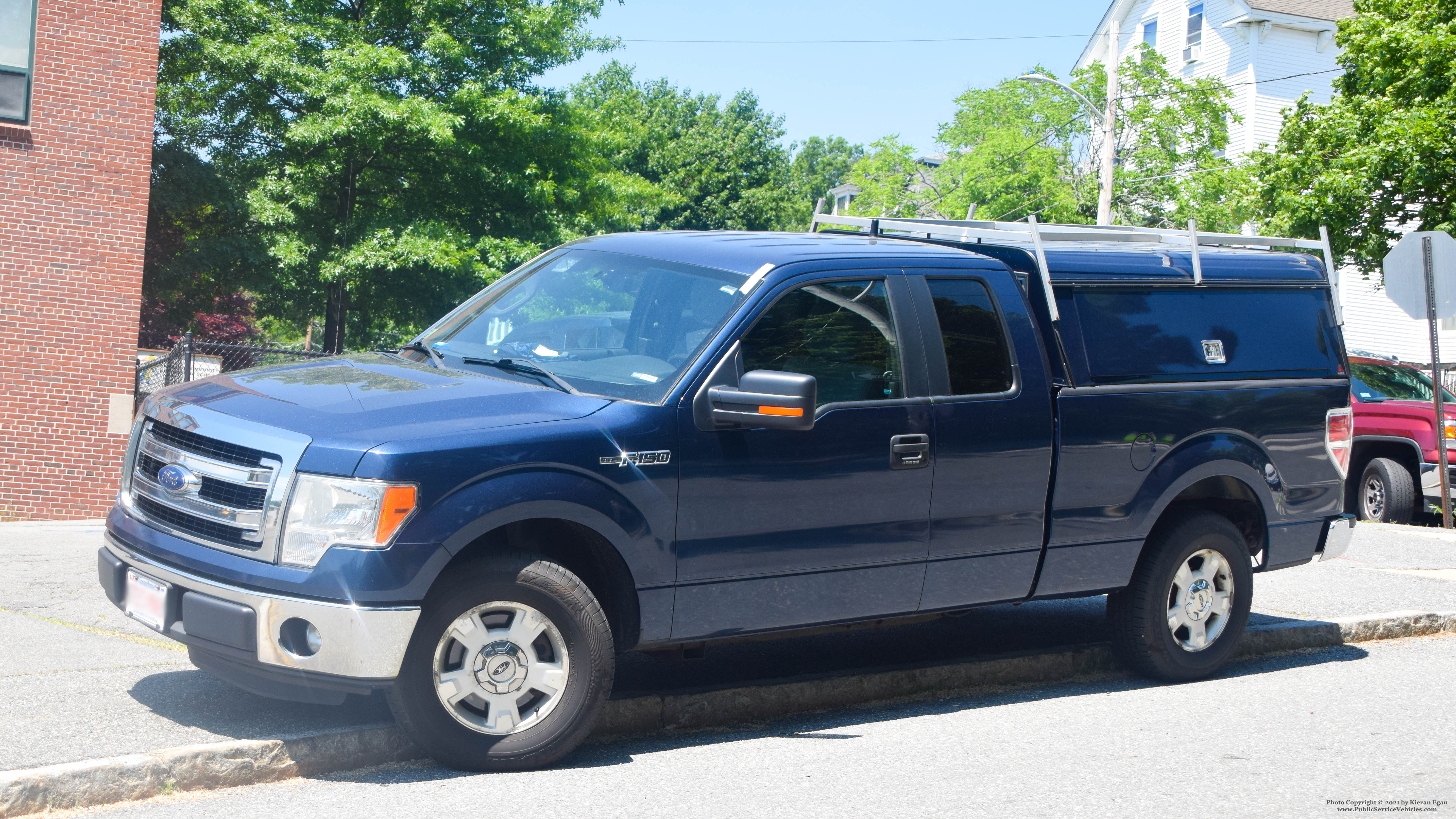 A photo  of Massachusetts State Police
            Unmarked Unit, a 2009-2014 Ford F-150 XLT SuperCab             taken by Kieran Egan