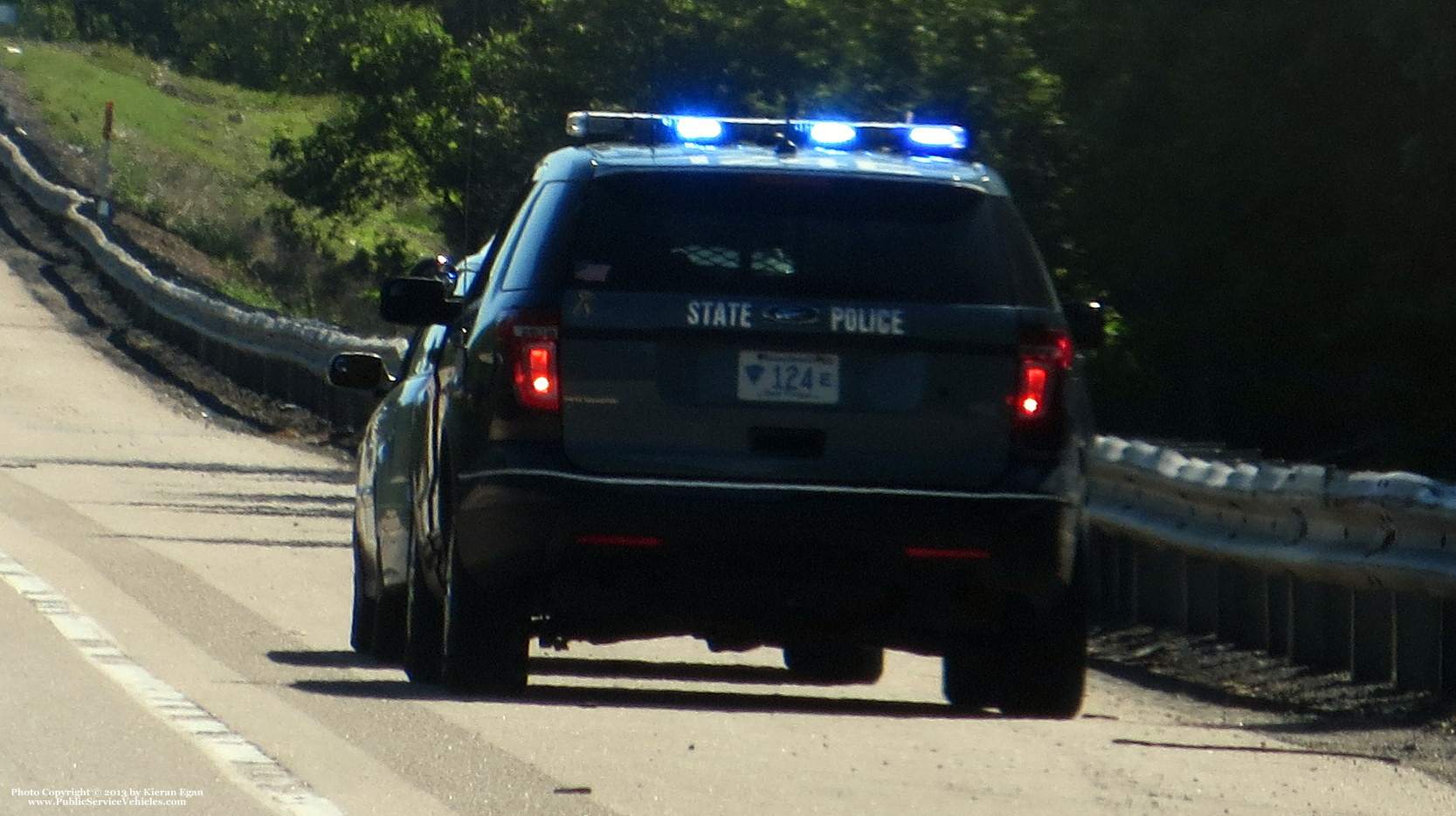 A photo  of Massachusetts State Police
            Cruiser 124E, a 2013 Ford Police Interceptor Utility             taken by Kieran Egan
