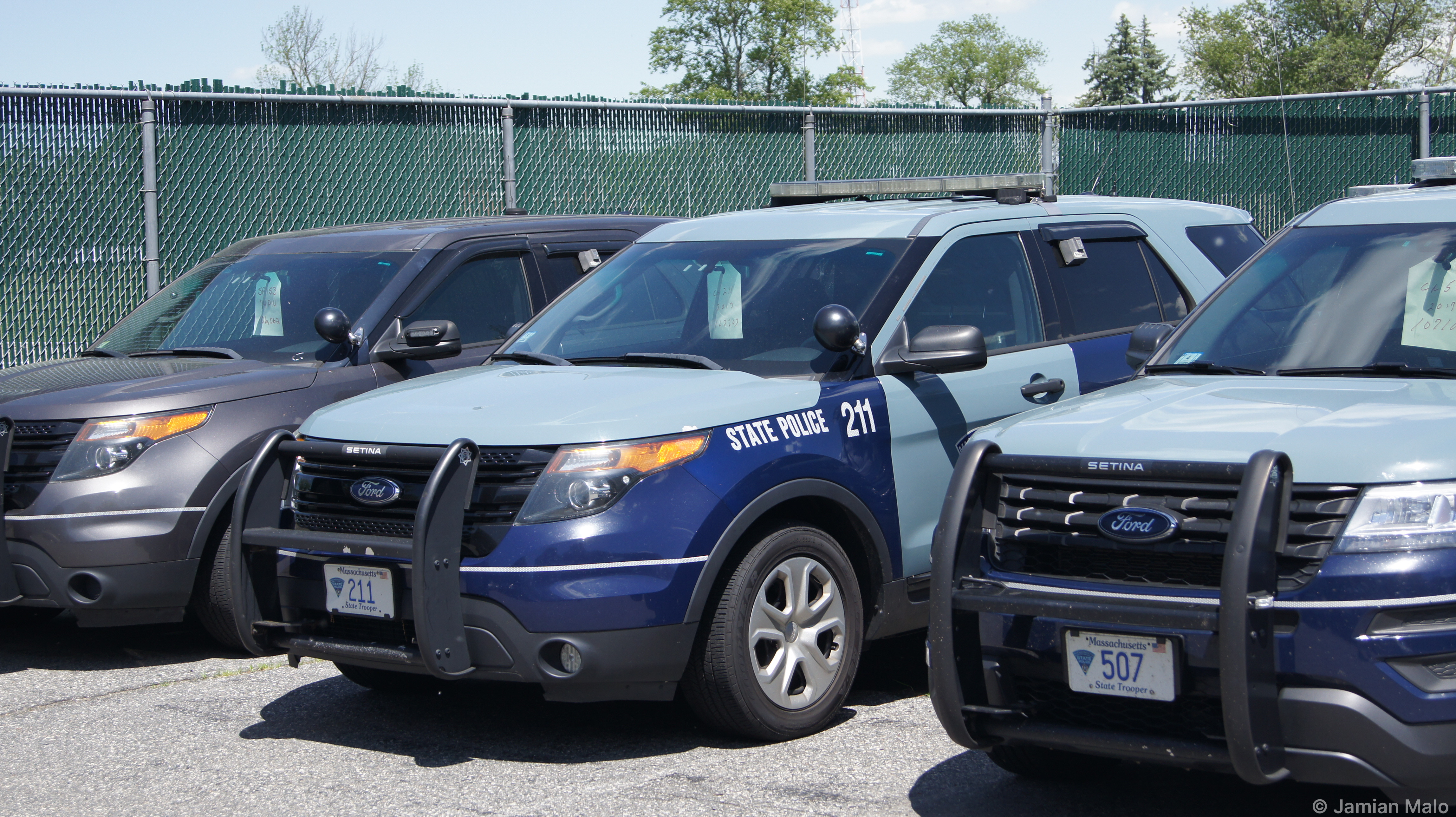 A photo  of Massachusetts State Police
            Cruiser 211, a 2013-2014 Ford Police Interceptor Utility             taken by Jamian Malo