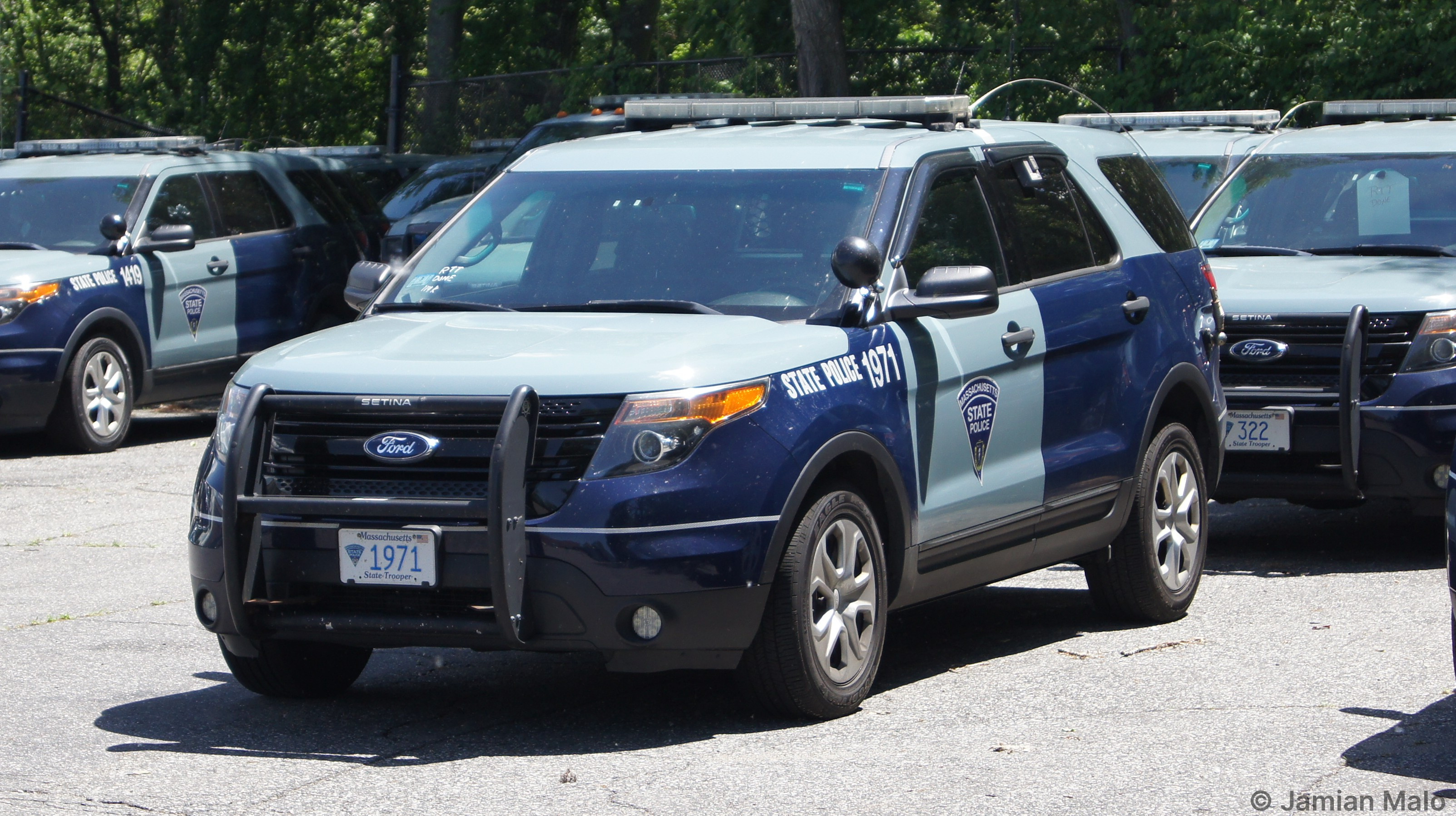 A photo  of Massachusetts State Police
            Cruiser 1971, a 2013-2014 Ford Police Interceptor Utility             taken by Jamian Malo