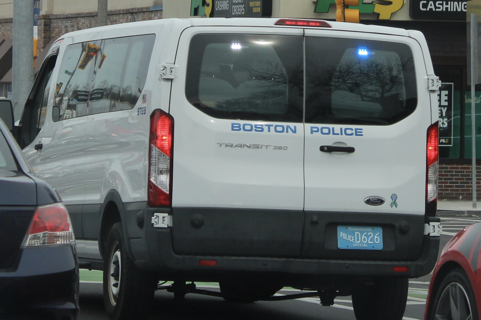 A photo  of Boston Police
            Car 9728, a 2019 Ford Transit 350             taken by @riemergencyvehicles