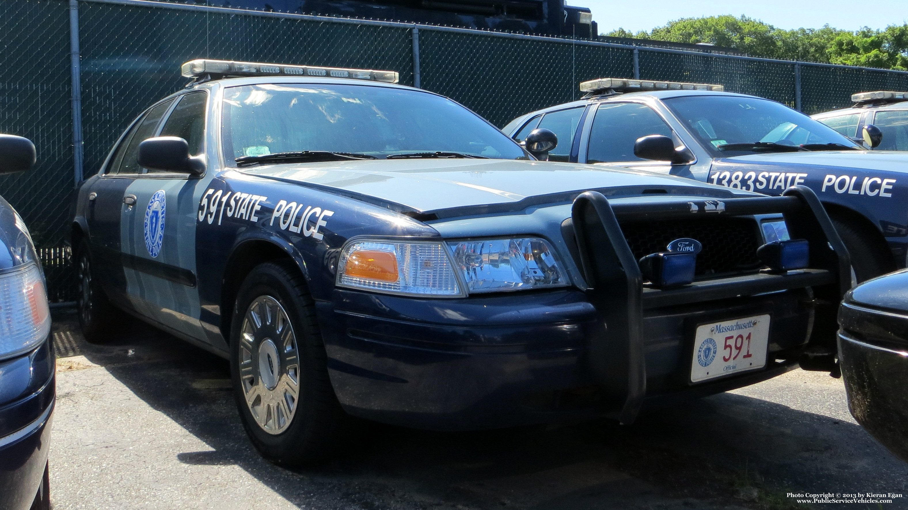A photo  of Massachusetts State Police
            Cruiser 591, a 2003-2005 Ford Crown Victoria Police Interceptor             taken by Kieran Egan