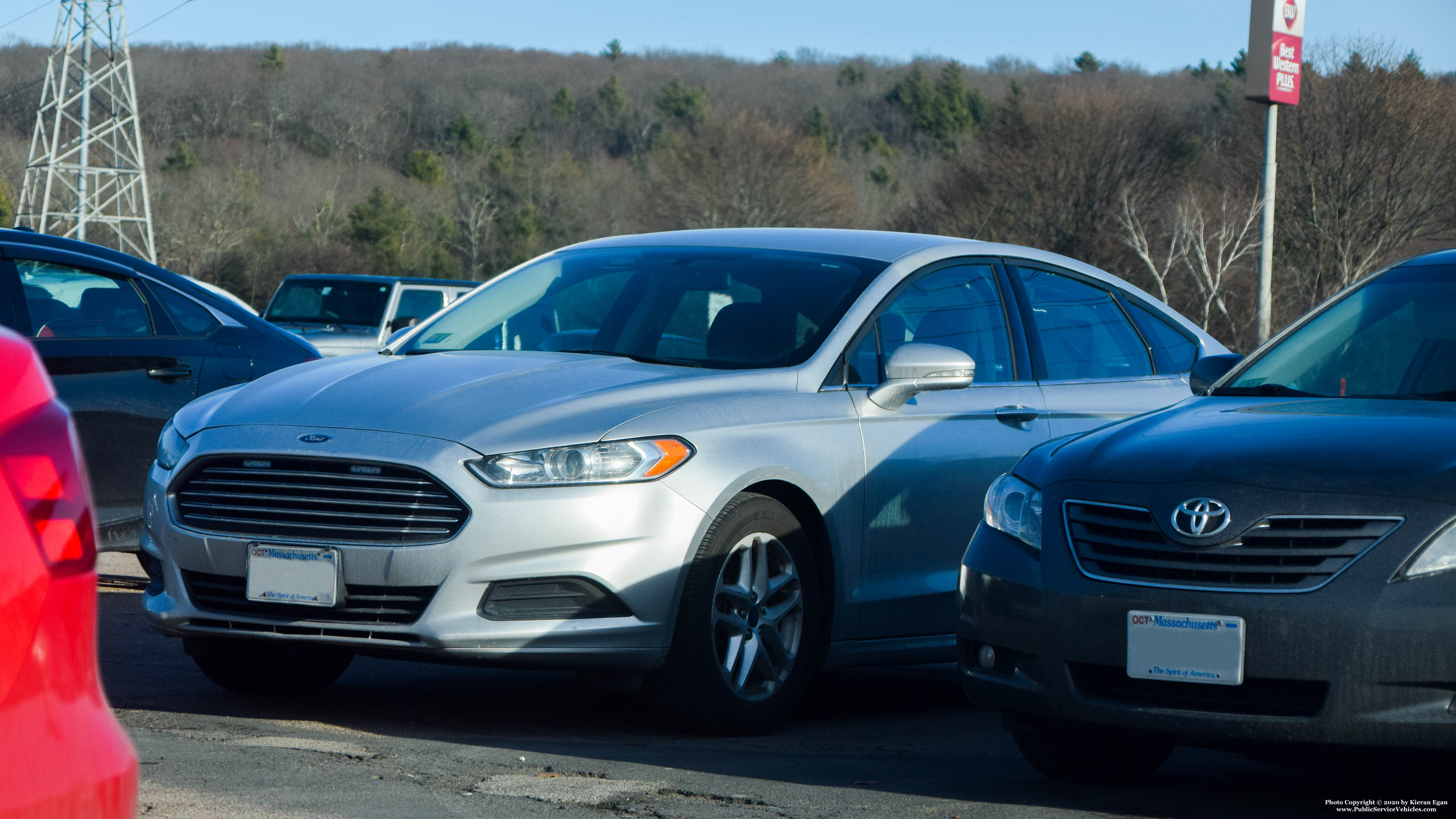 A photo  of Massachusetts State Police
            Unmarked Unit, a 2012-2019 Ford Fusion             taken by Kieran Egan