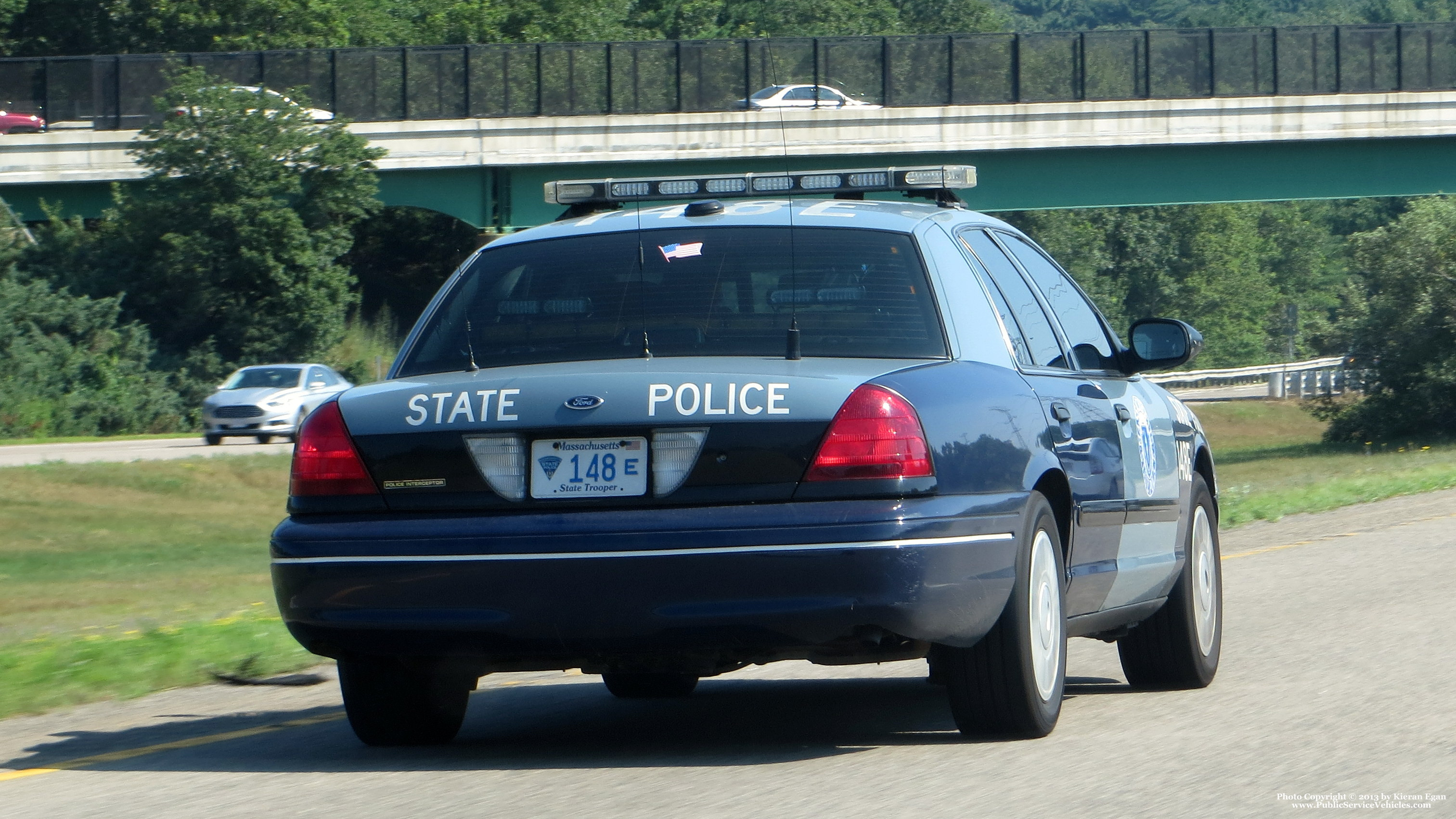 A photo  of Massachusetts State Police
            Cruiser 148E, a 2006-2009 Ford Crown Victoria Police Interceptor             taken by Kieran Egan