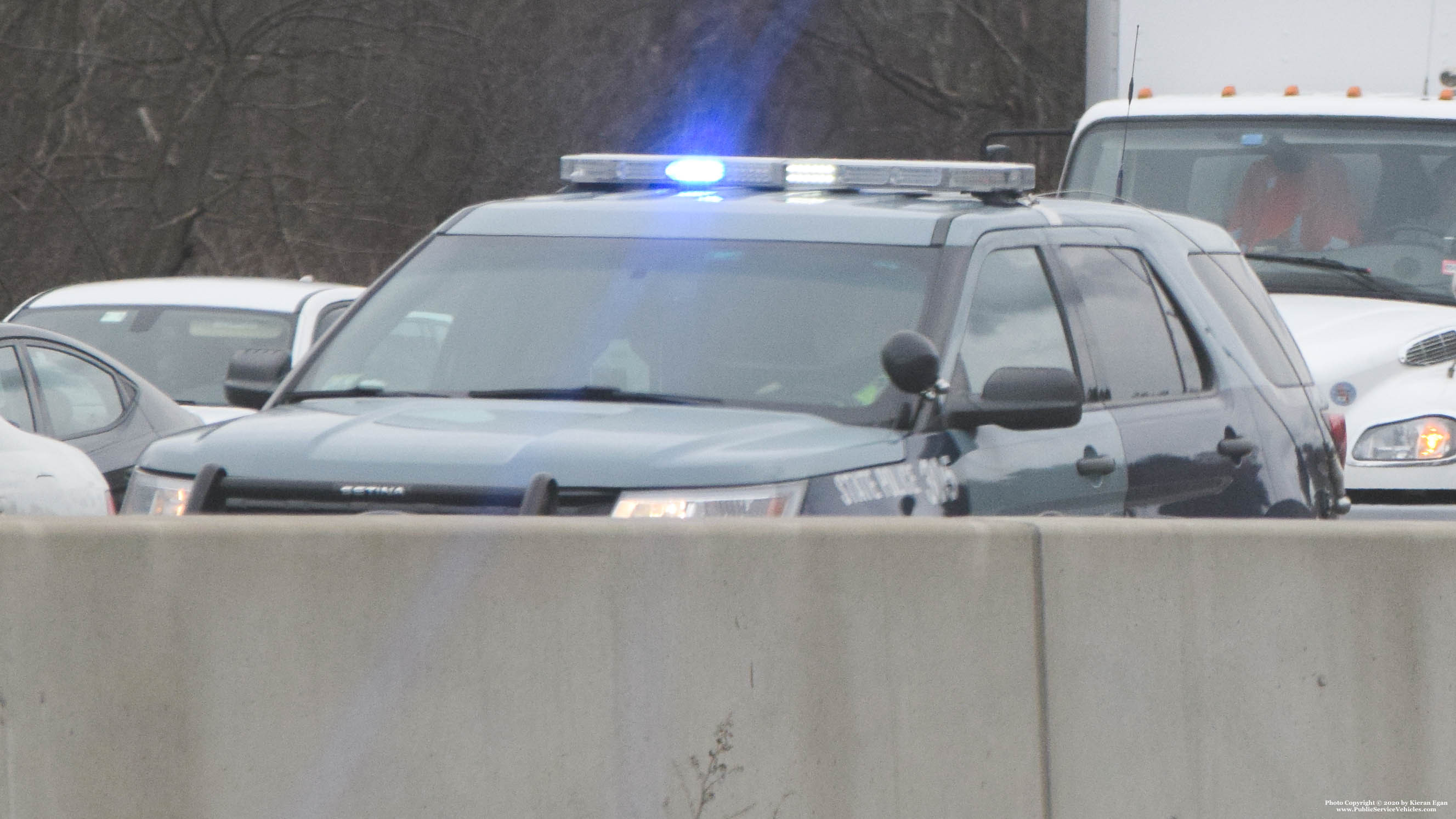 A photo  of Massachusetts State Police
            Cruiser 305, a 2016 Ford Police Interceptor Utility             taken by Kieran Egan