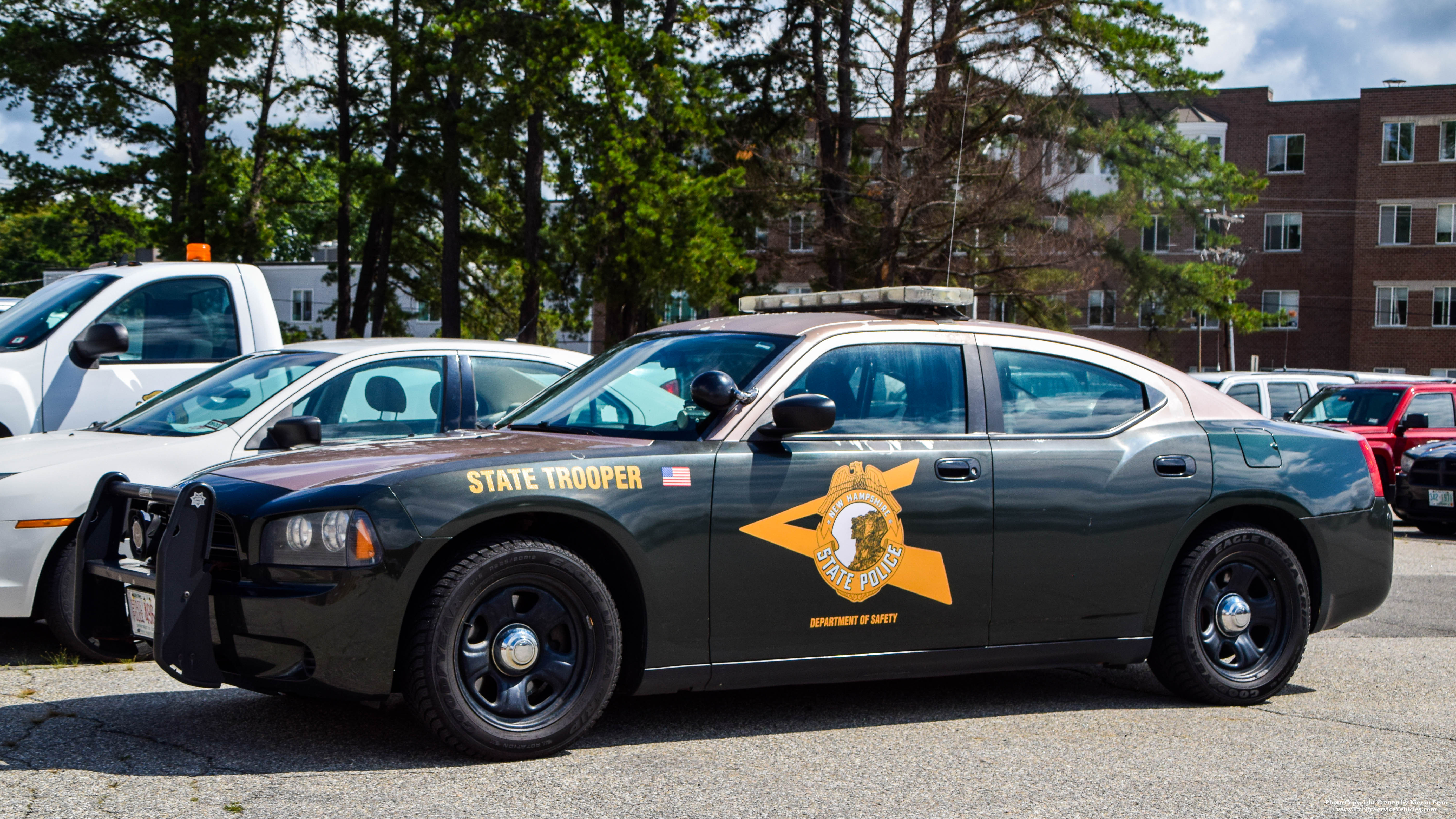 A photo  of New Hampshire State Police
            Cruiser 496, a 2006-2010 Dodge Charger             taken by Kieran Egan