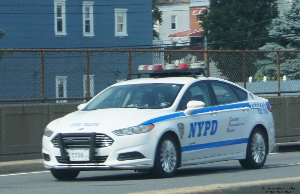 A photo  of New York Police Department
            Cruiser 7756 18, a 2018 Ford Fusion/Federal Signal Vision SLR             taken by Jamian Malo