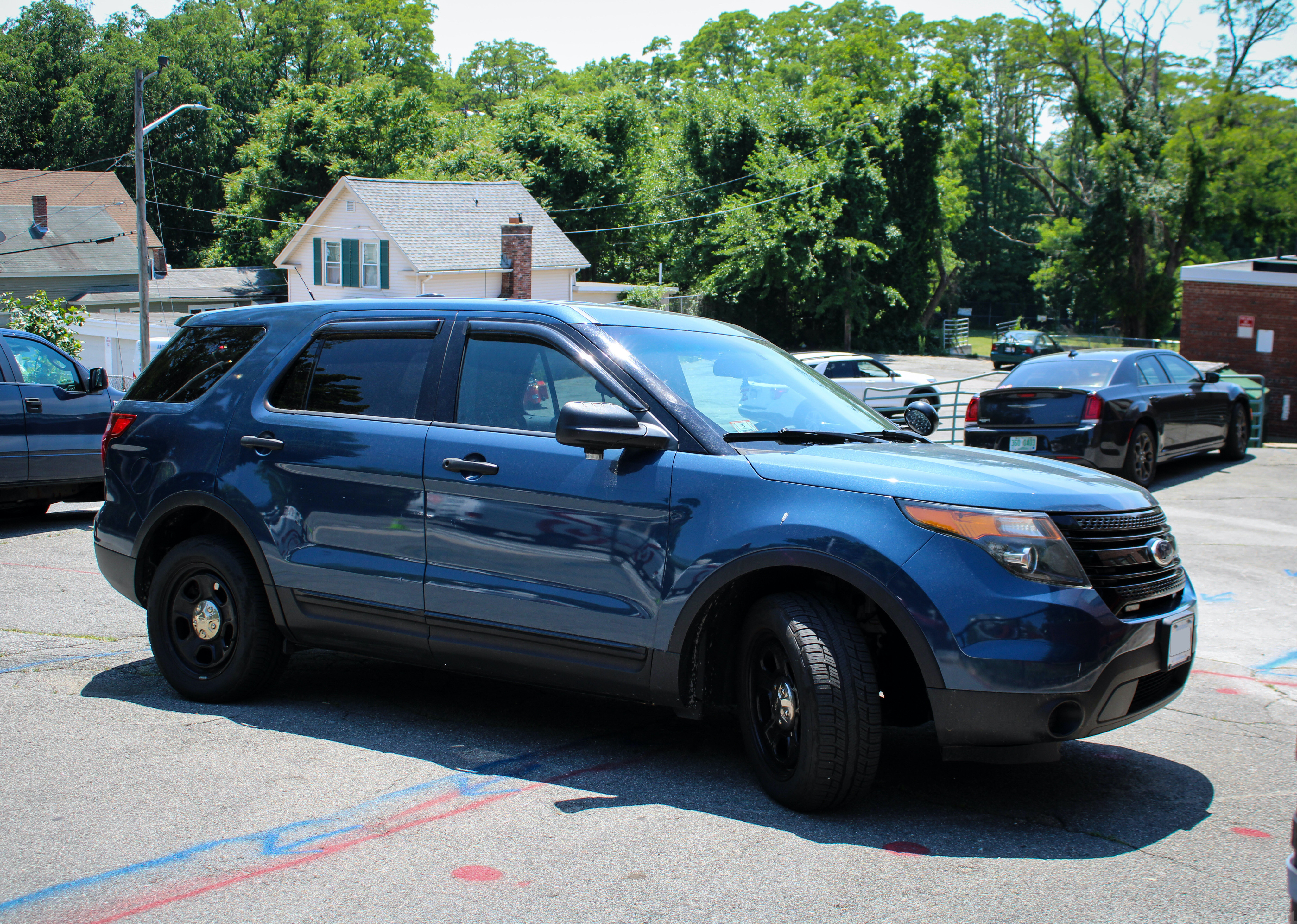 A photo  of Lowell Police
            Unmarked Unit, a 2013-2015 Ford Police Interceptor Utility             taken by Nicholas You