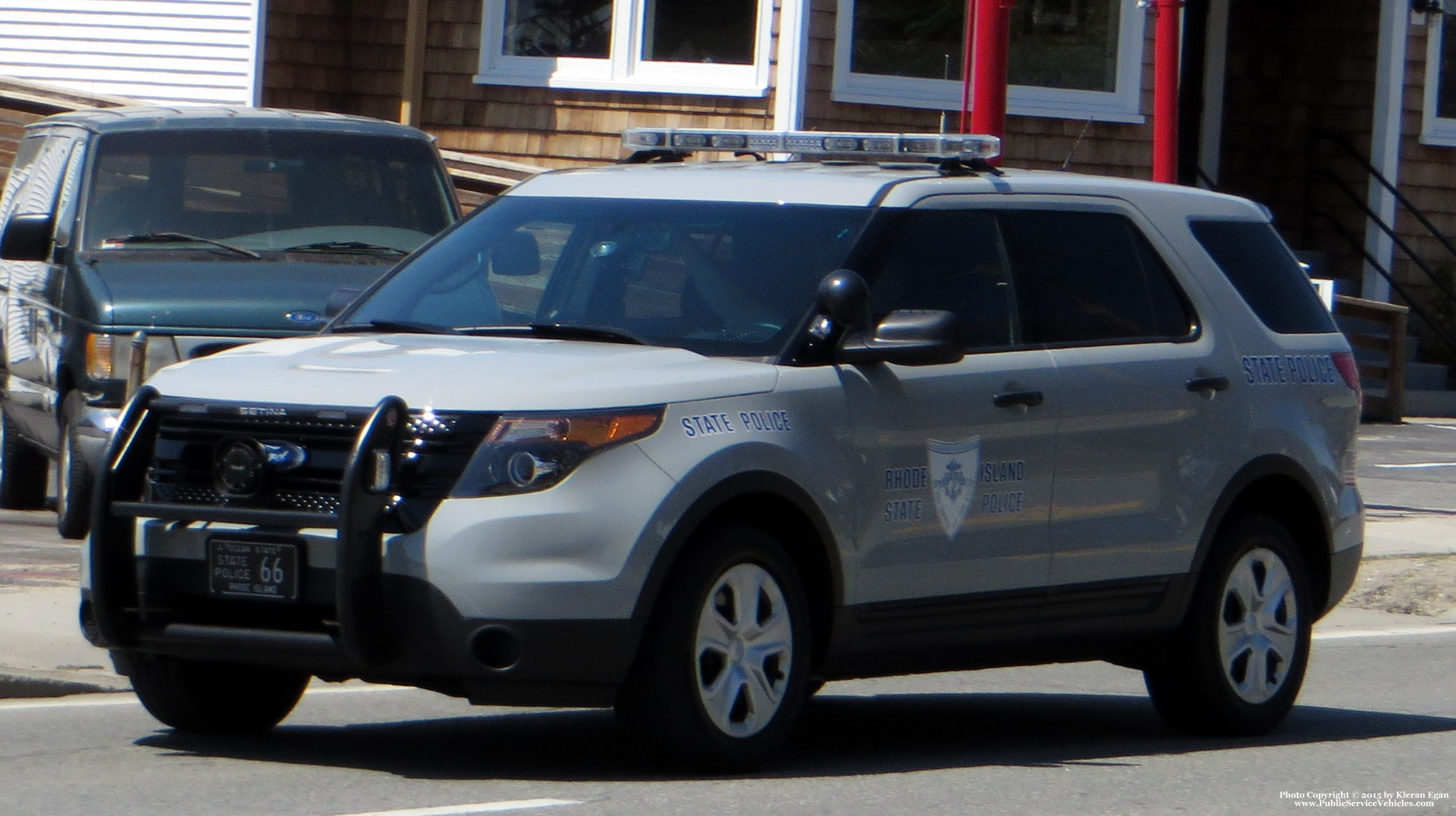 A photo  of Rhode Island State Police
            Cruiser 66, a 2013-2015 Ford Police Interceptor Utility             taken by Kieran Egan