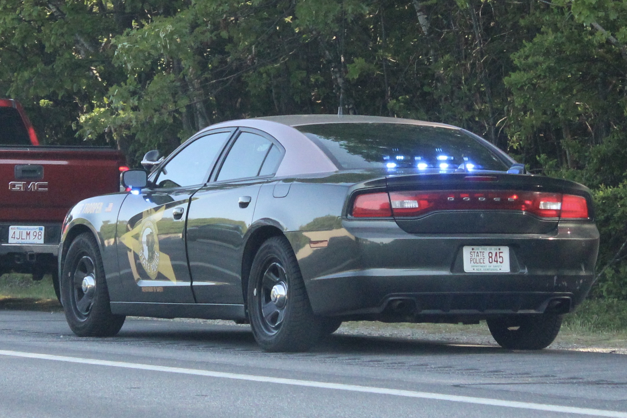 A photo  of New Hampshire State Police
            Cruiser 845, a 2011-2014 Dodge Charger             taken by @riemergencyvehicles