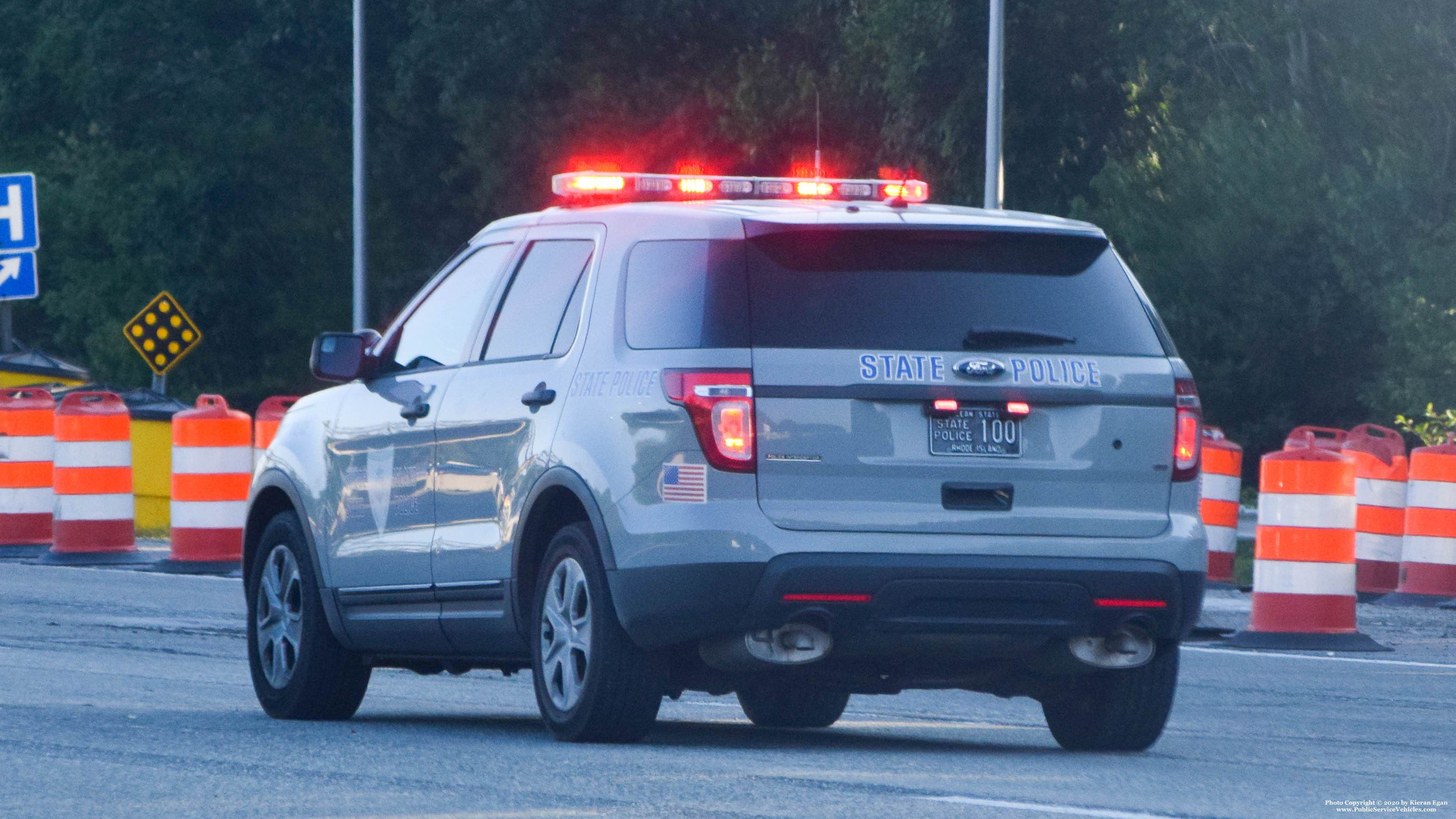 A photo  of Rhode Island State Police
            Cruiser 100, a 2013-2015 Ford Police Interceptor Utility             taken by Kieran Egan