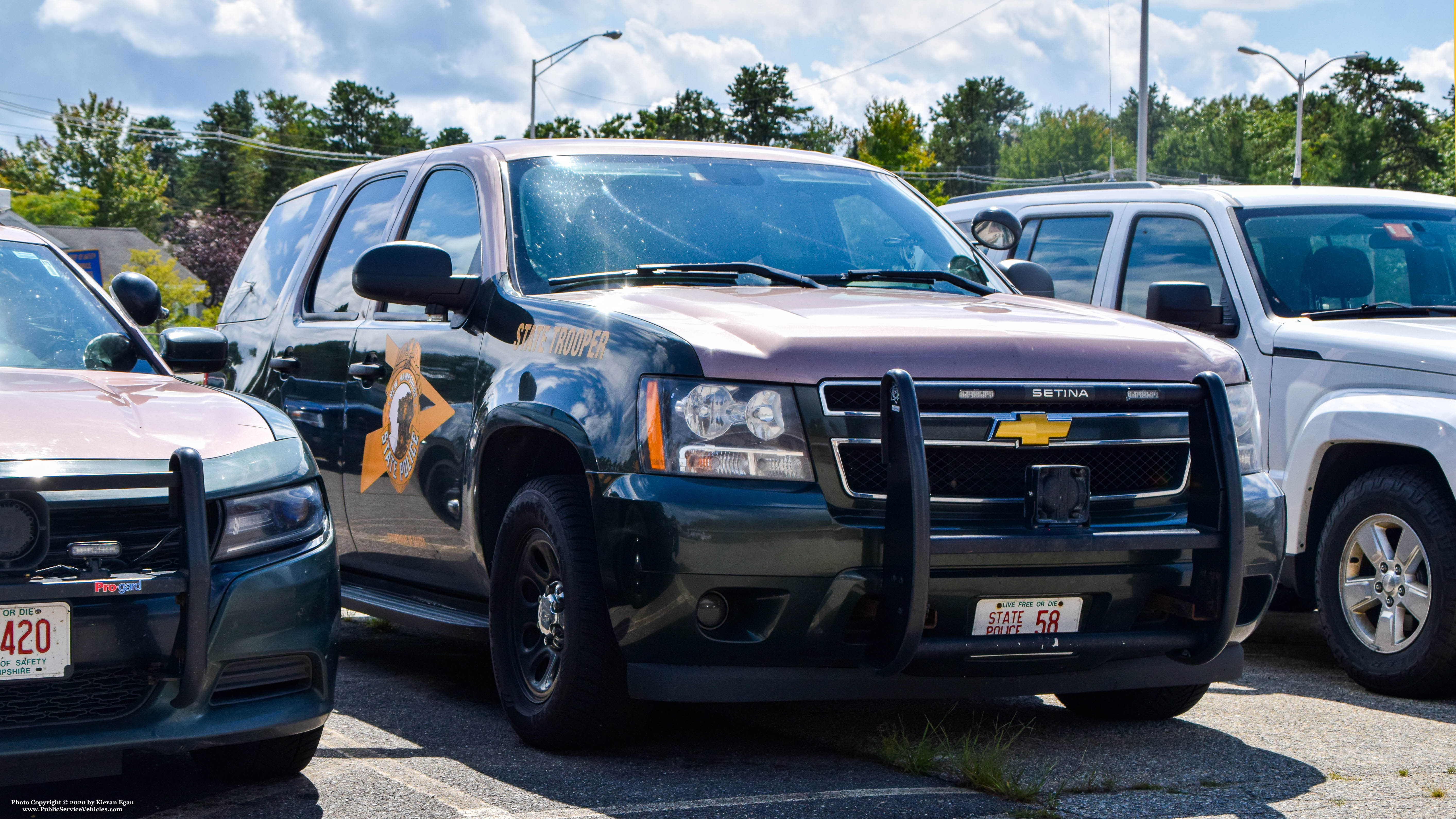 A photo  of New Hampshire State Police
            Cruiser 58, a 2007-2014 Chevrolet Tahoe             taken by Kieran Egan