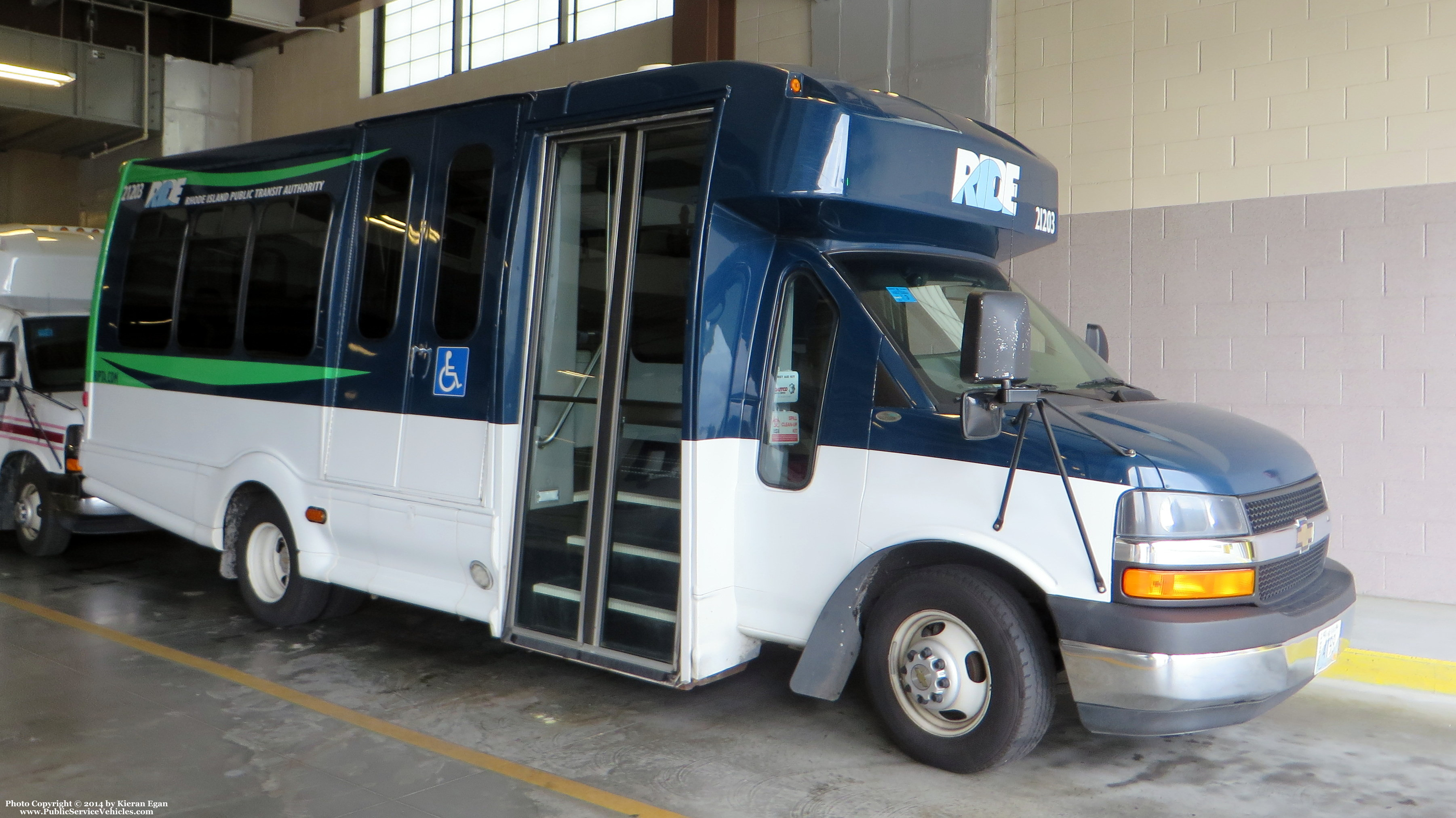 A photo  of Rhode Island Public Transit Authority
            Paratransit Bus 21203, a 2012 Chevrolet 4500 Bus             taken by Kieran Egan