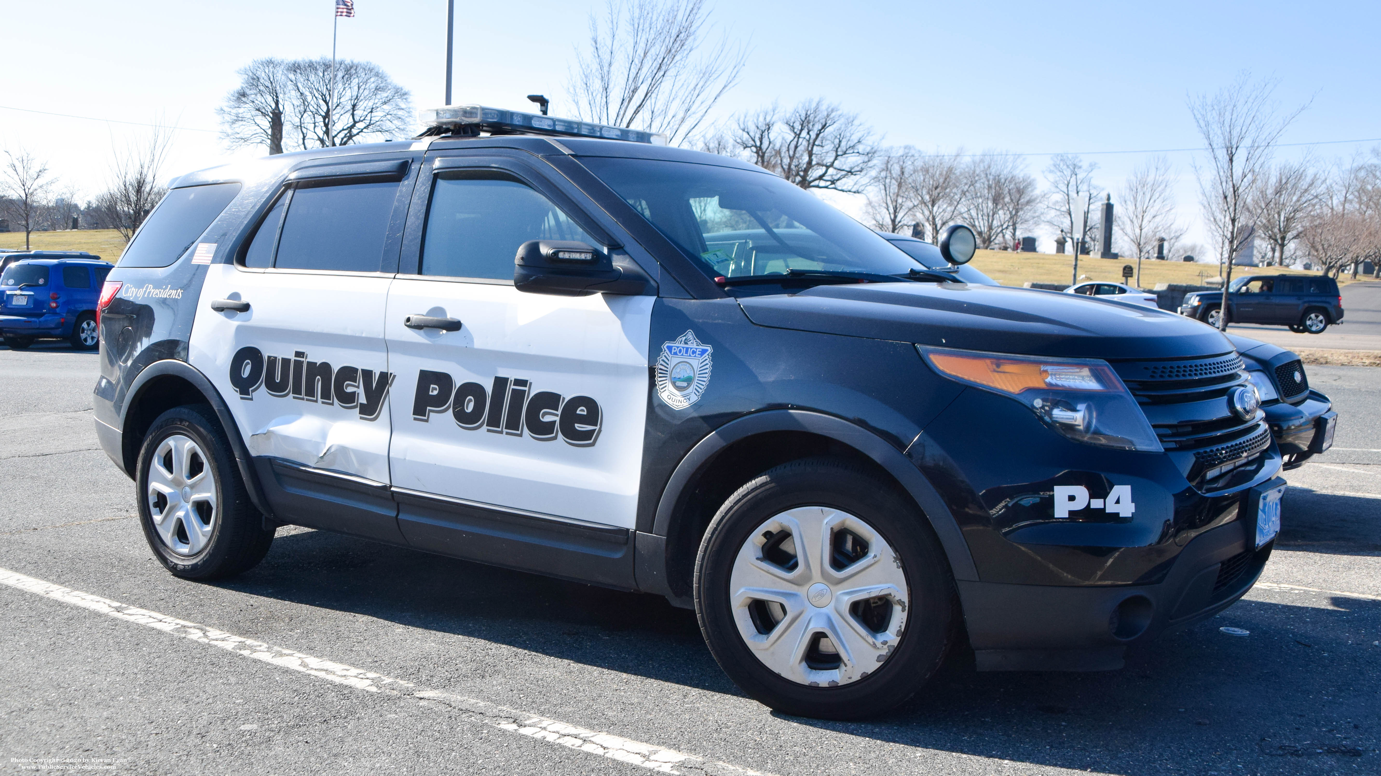 A photo  of Quincy Police
            P-4, a 2013-2015 Ford Police Interceptor Utility             taken by Kieran Egan