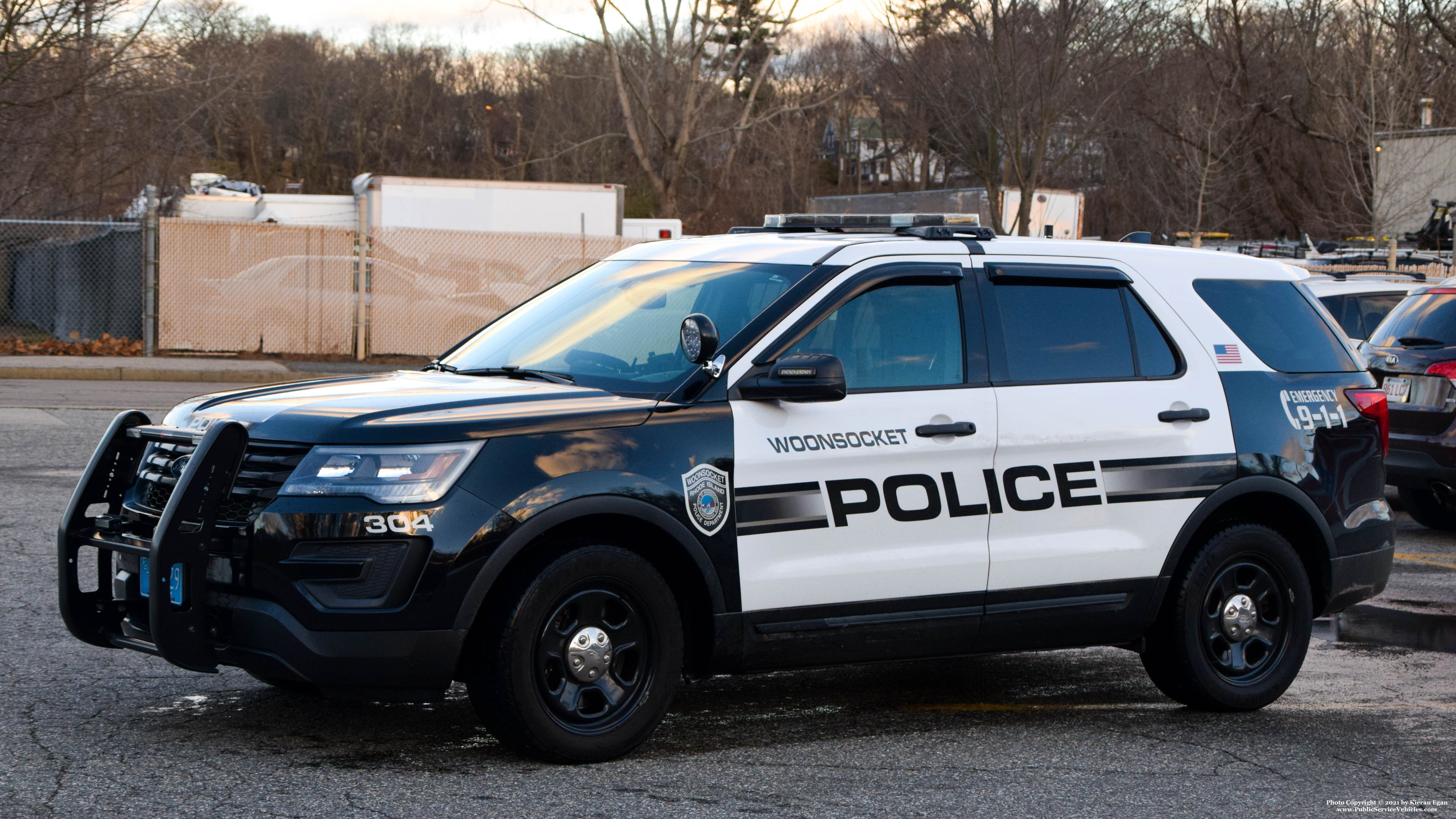 A photo  of Woonsocket Police
            Cruiser 304, a 2017-2019 Ford Police Interceptor Utility             taken by Kieran Egan