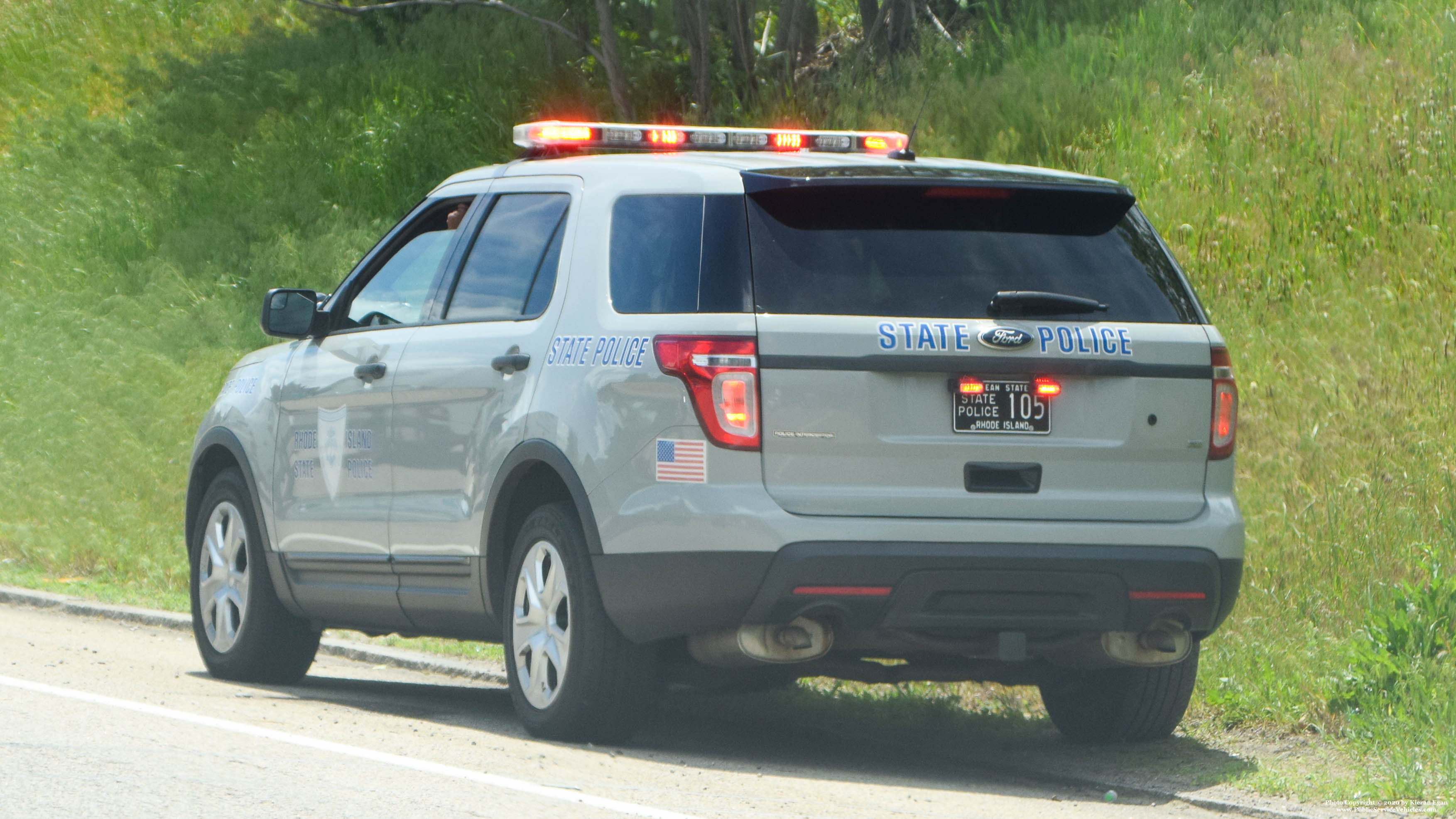 A photo  of Rhode Island State Police
            Cruiser 105, a 2013-2015 Ford Police Interceptor Utility             taken by Kieran Egan