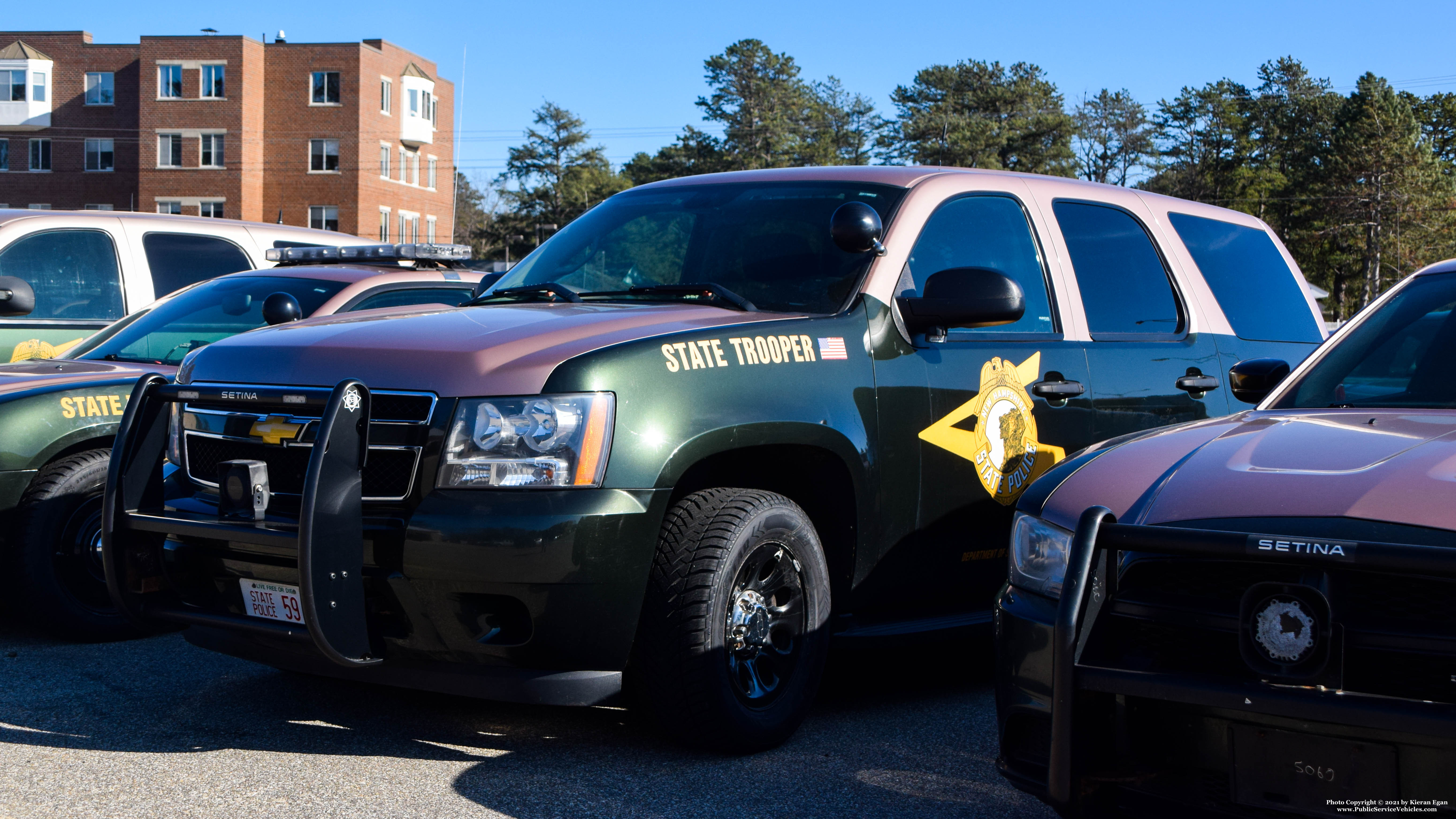 A photo  of New Hampshire State Police
            Cruiser 59, a 2007-2014 Chevrolet Tahoe             taken by Kieran Egan