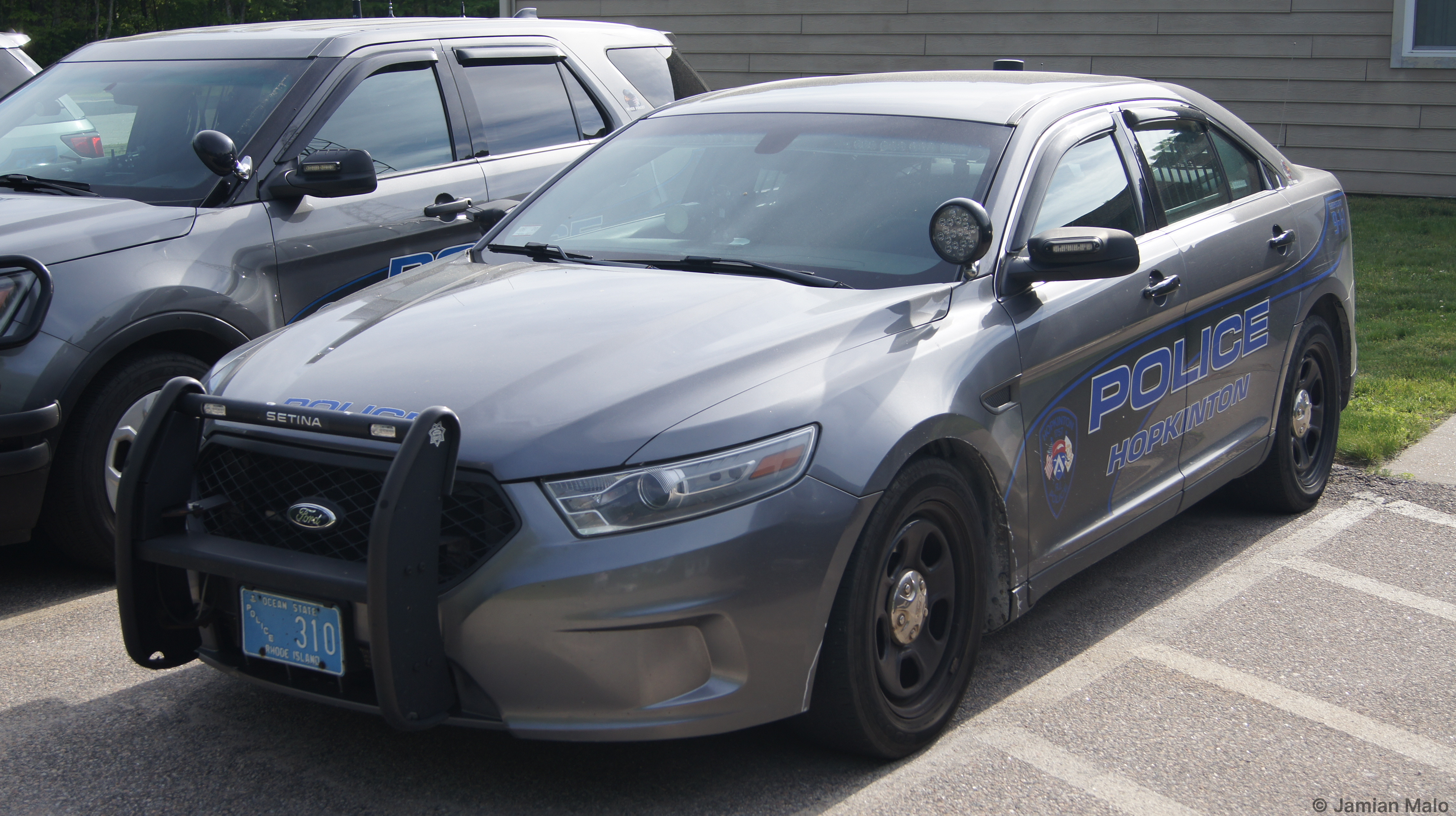 A photo  of Hopkinton Police
            Cruiser 310, a 2013 Ford Police Interceptor Sedan             taken by Jamian Malo