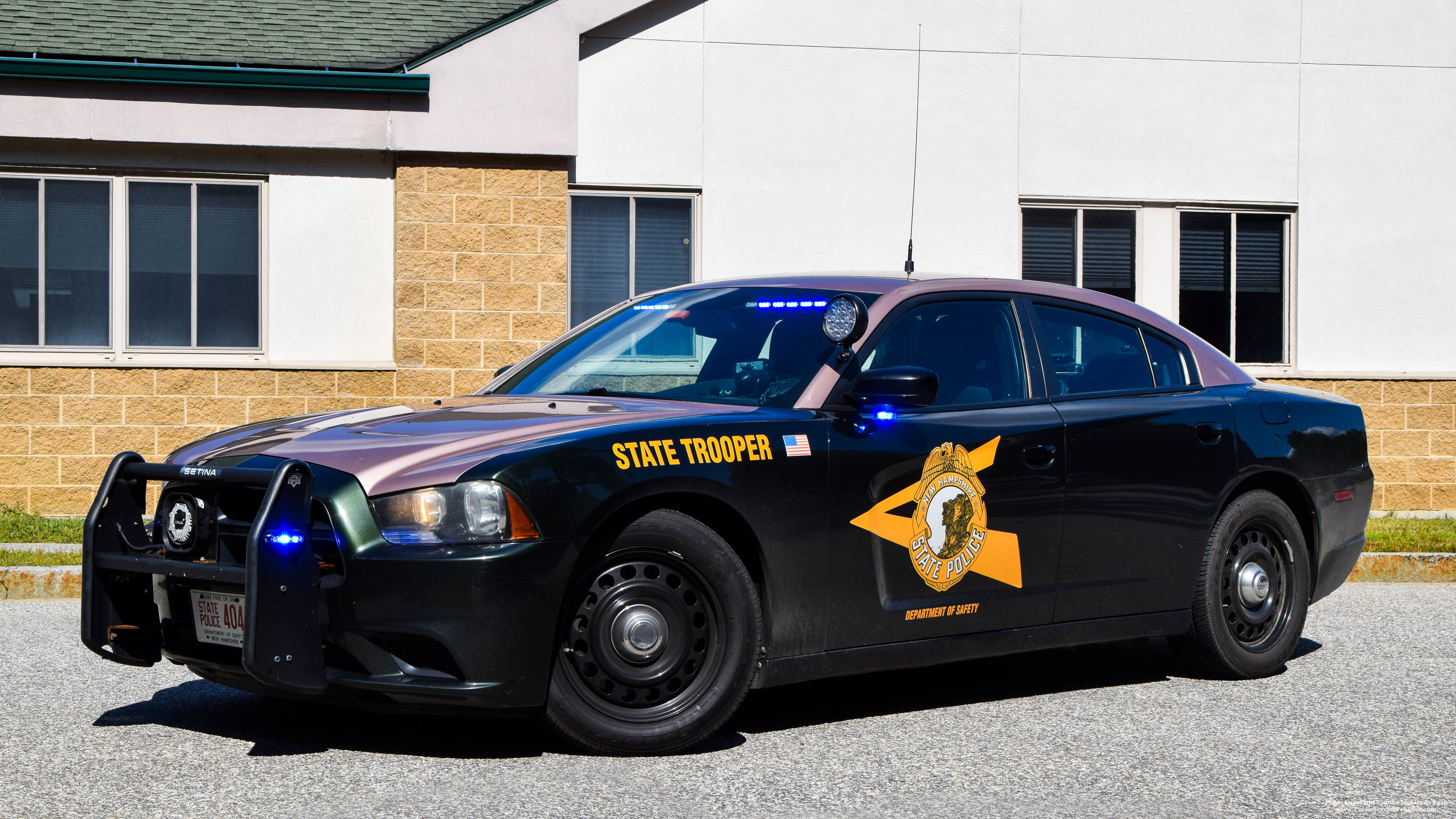 A photo  of New Hampshire State Police
            Cruiser 404, a 2014 Dodge Charger             taken by Kieran Egan