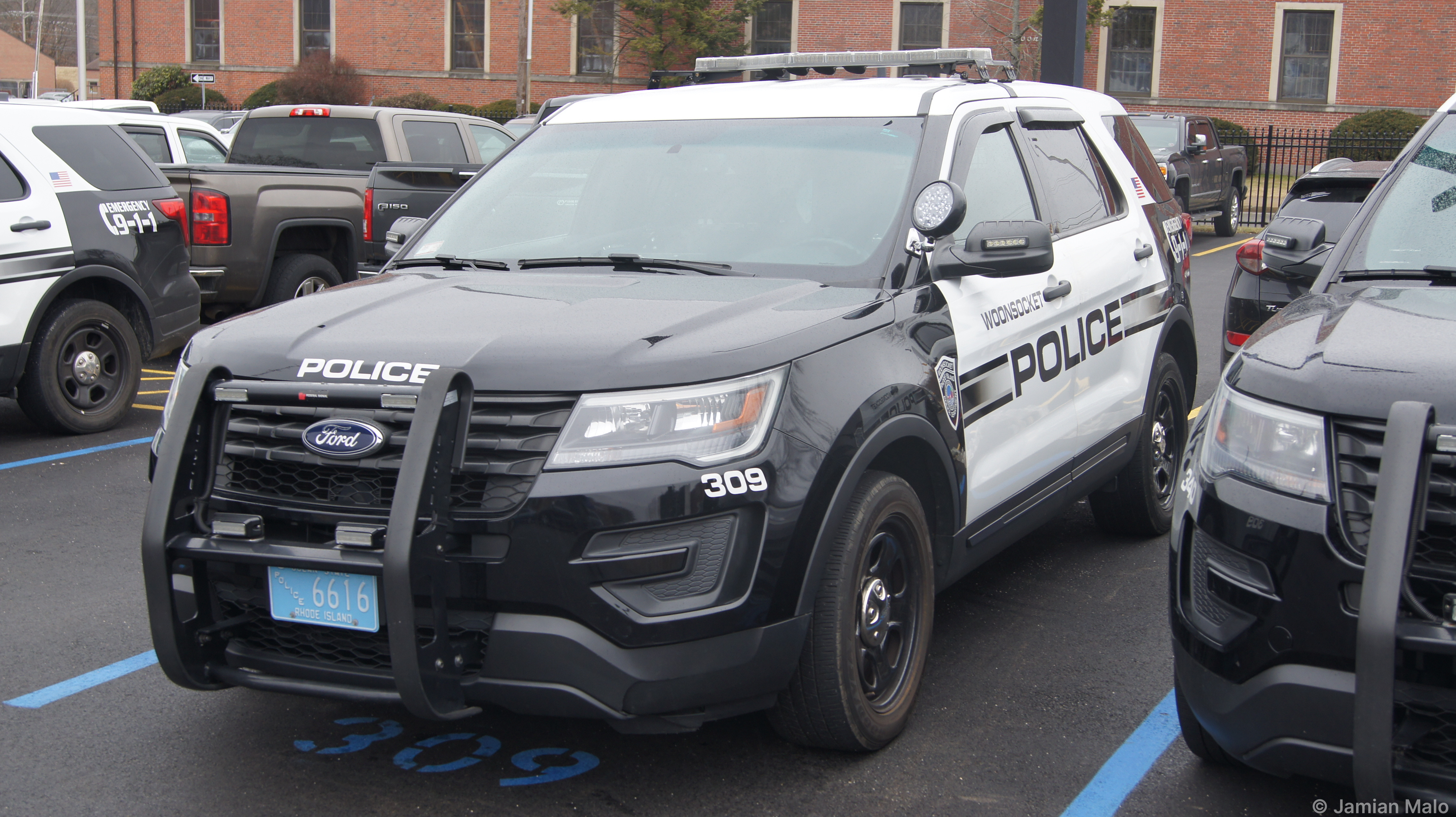A photo  of Woonsocket Police
            Cruiser 309, a 2016-2018 Ford Police Interceptor Utility             taken by Jamian Malo