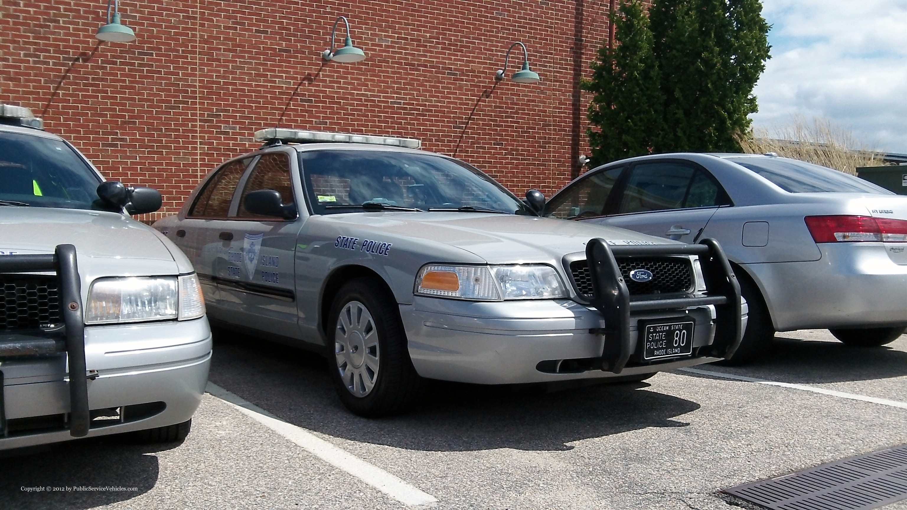 A photo  of Rhode Island State Police
            Cruiser 80, a 2006-2008 Ford Crown Victoria Police Interceptor             taken by Kieran Egan