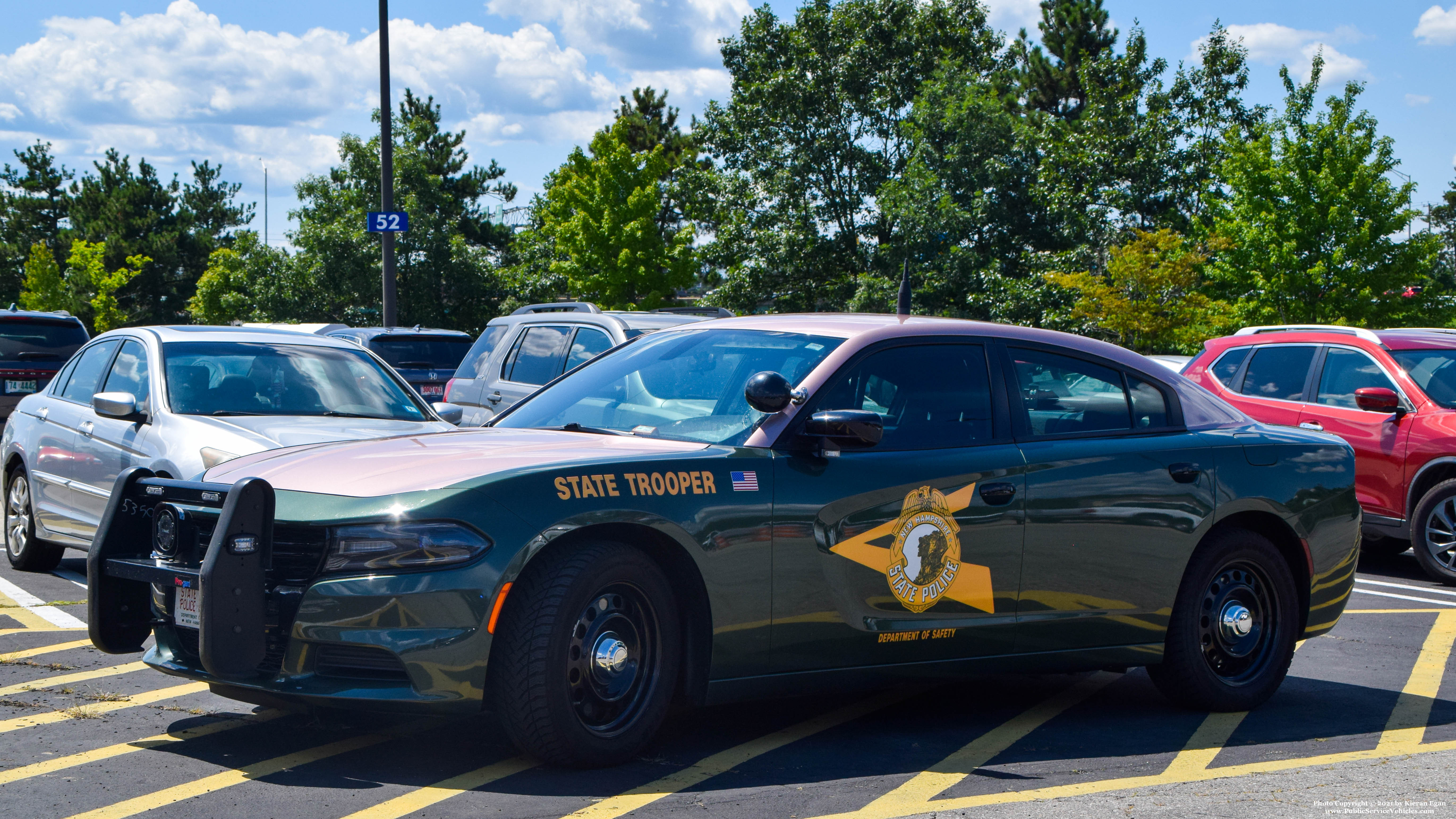 A photo  of New Hampshire State Police
            Cruiser 203, a 2017-2019 Dodge Charger             taken by Kieran Egan