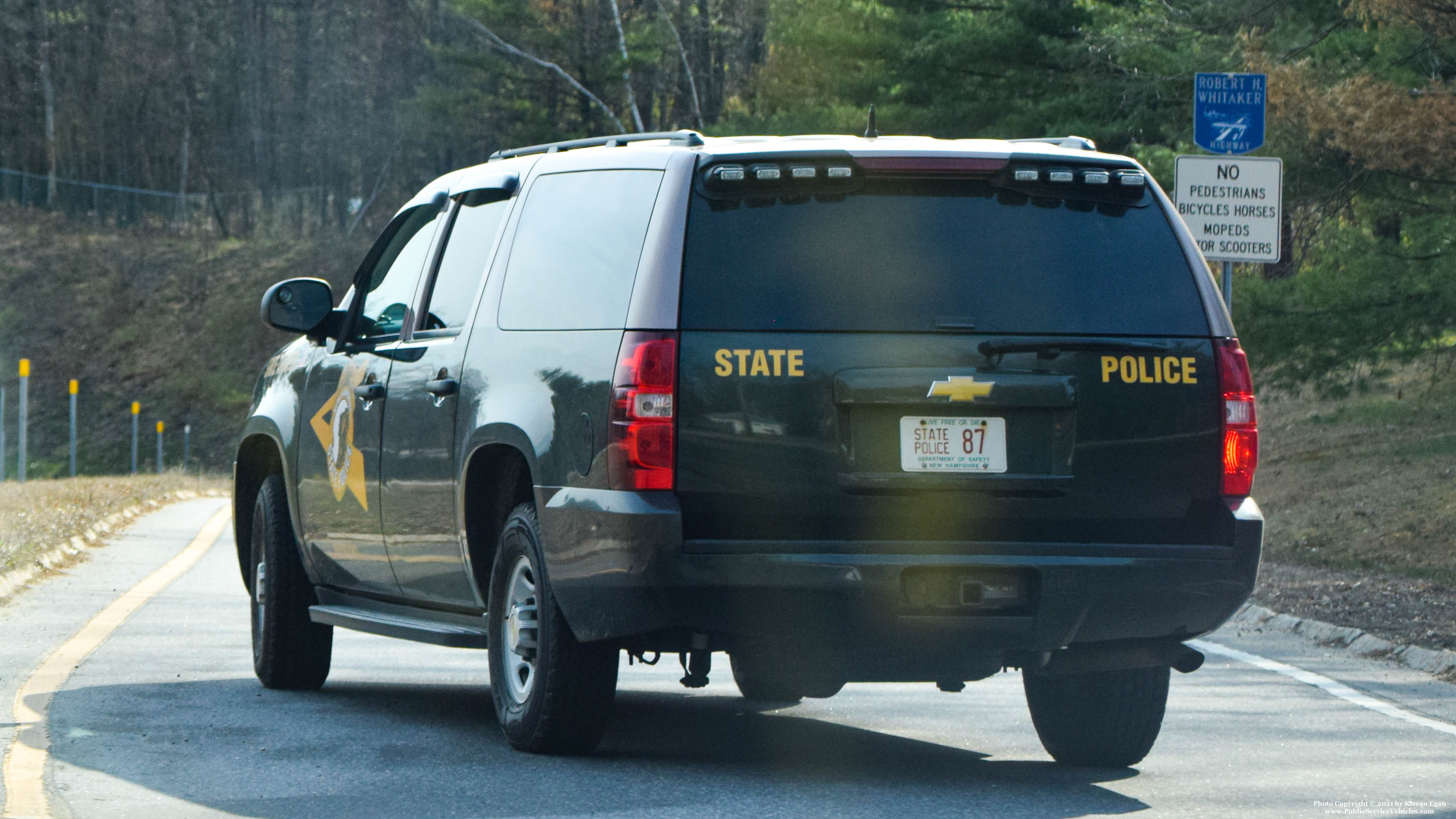 A photo  of New Hampshire State Police
            Cruiser 87, a 2007-2014 Chevrolet Suburban             taken by Kieran Egan