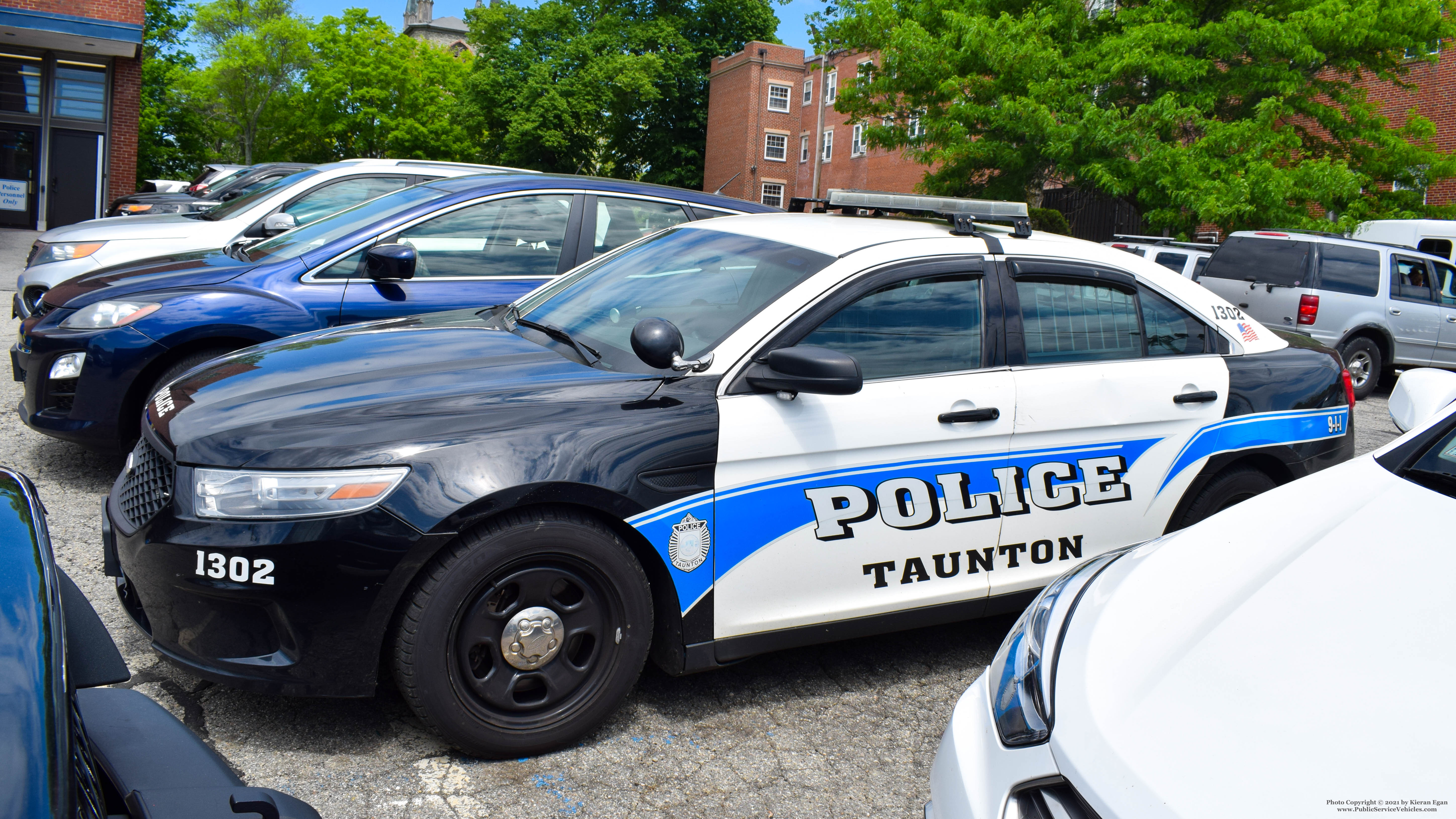 A photo  of Taunton Police
            Cruiser 1302, a 2013 Ford Police Interceptor Sedan             taken by Kieran Egan