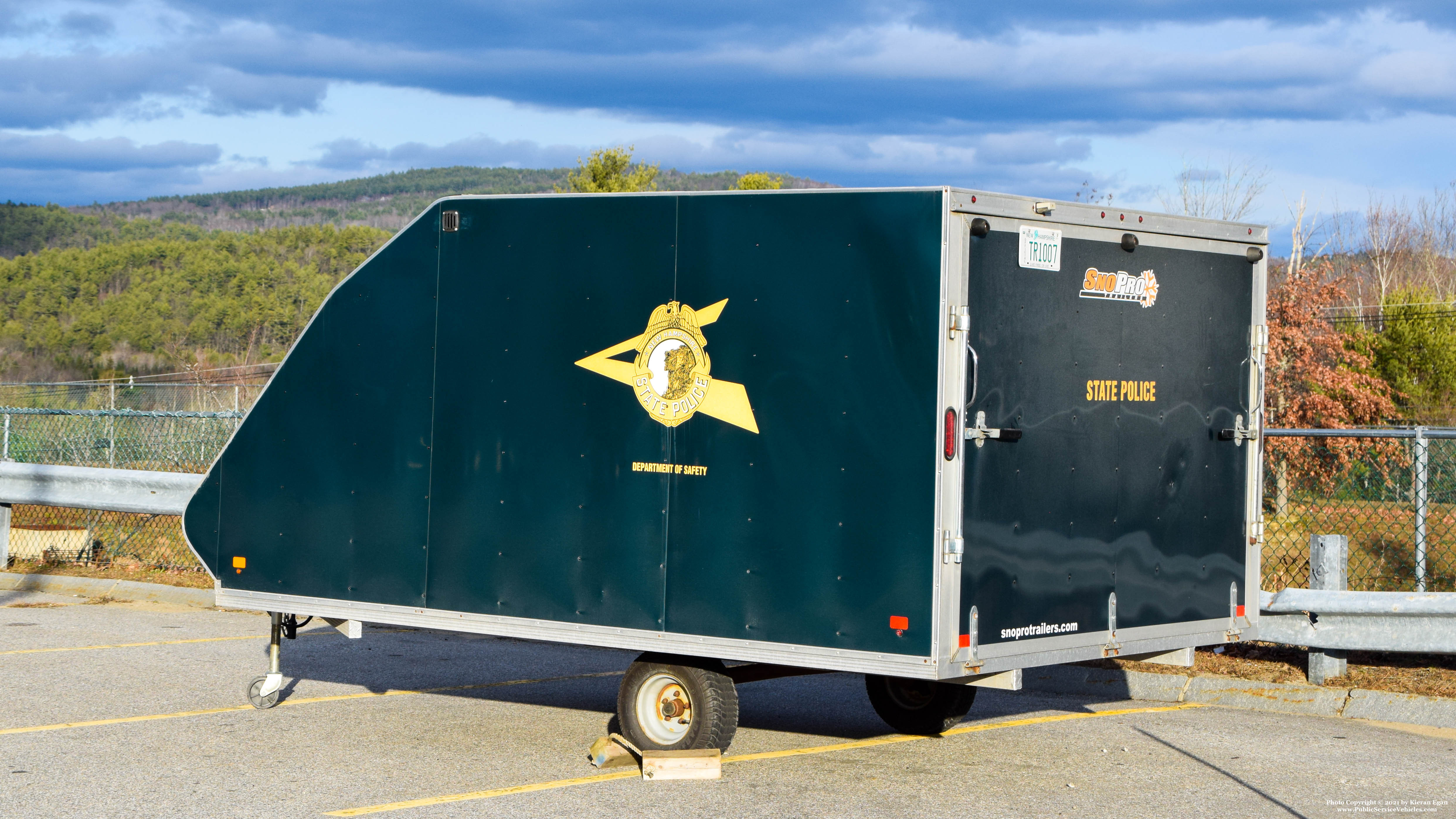 A photo  of New Hampshire State Police
            Snow Mobile Trailer, a 1990-2010 Sno Pro Trailer             taken by Kieran Egan