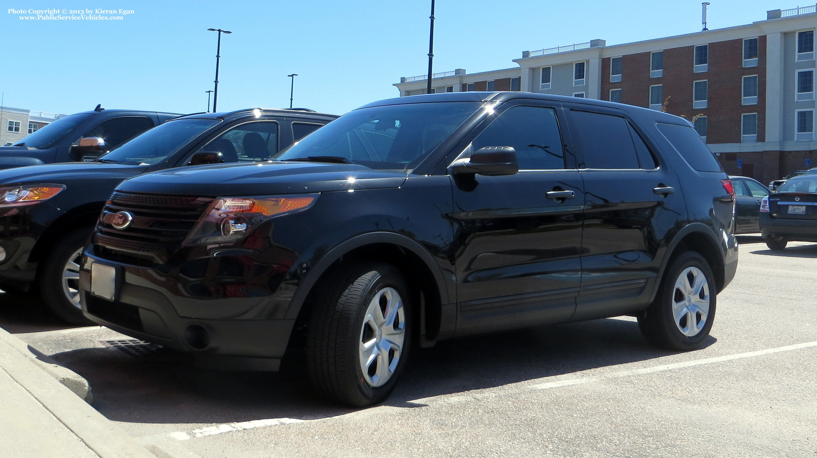 A photo  of Rhode Island State Police
            Unmarked Unit, a 2013-2015 Ford Police Interceptor Utility             taken by Kieran Egan