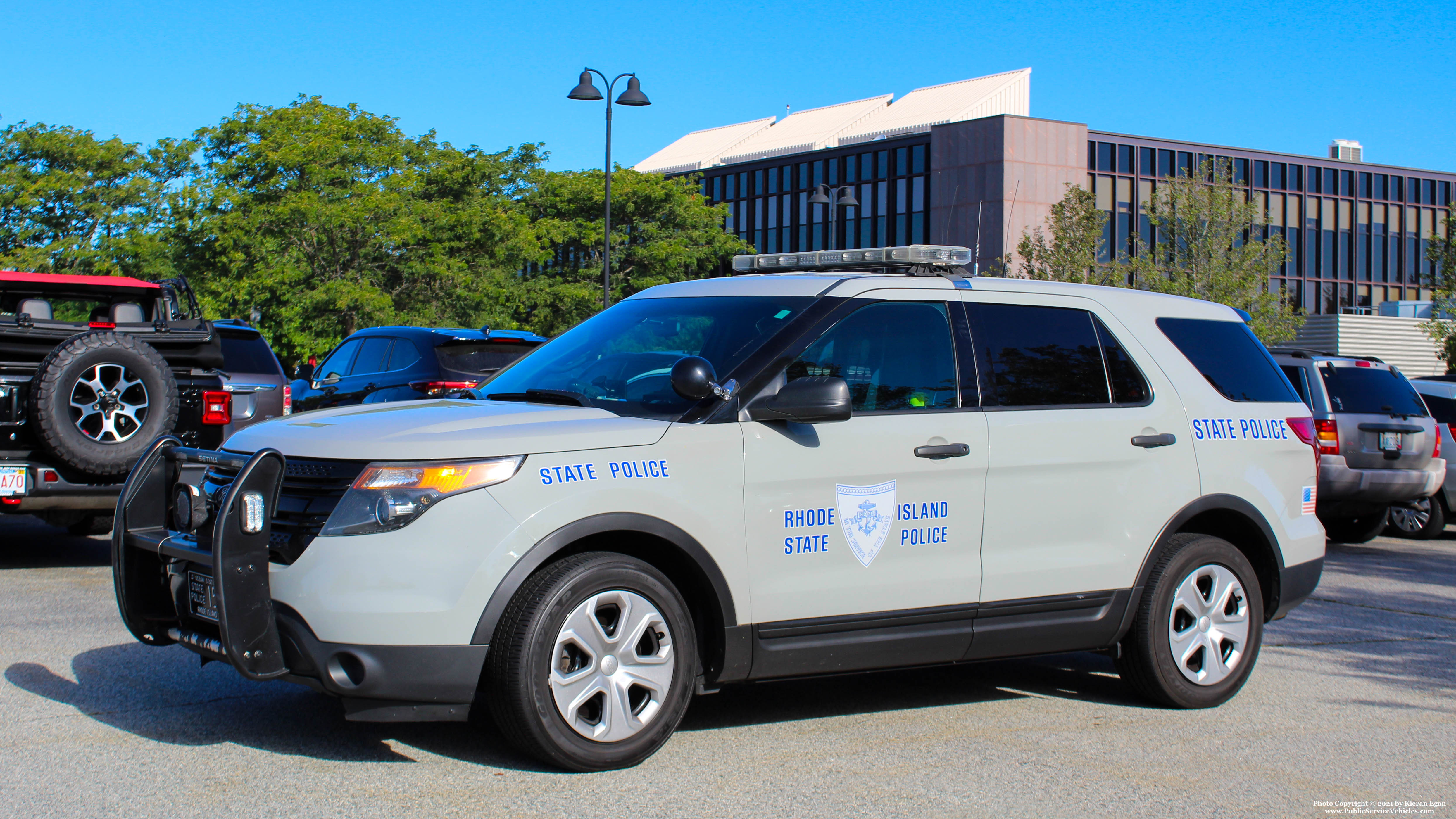 A photo  of Rhode Island State Police
            Cruiser 153, a 2013 Ford Police Interceptor Utility             taken by Kieran Egan