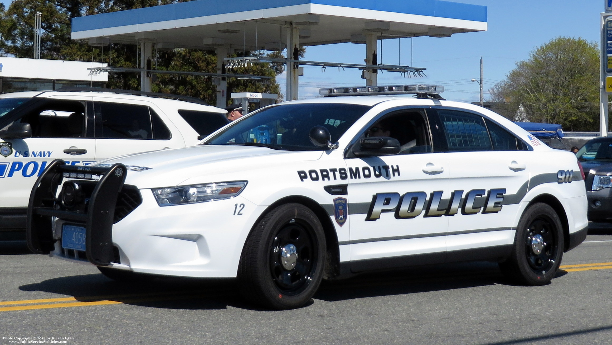 A photo  of Portsmouth Police
            Car 12, a 2014 Ford Police Interceptor Sedan             taken by Kieran Egan
