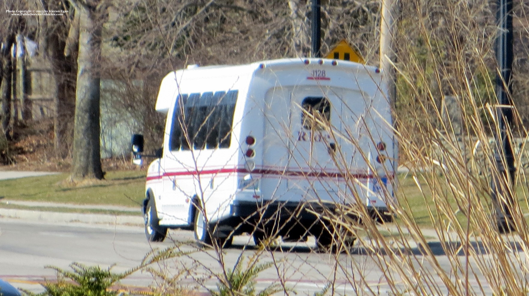 A photo  of Rhode Island Public Transit Authority
            Paratransit Bus 21128, a 2011 Chevrolet 4500 Bus             taken by Kieran Egan