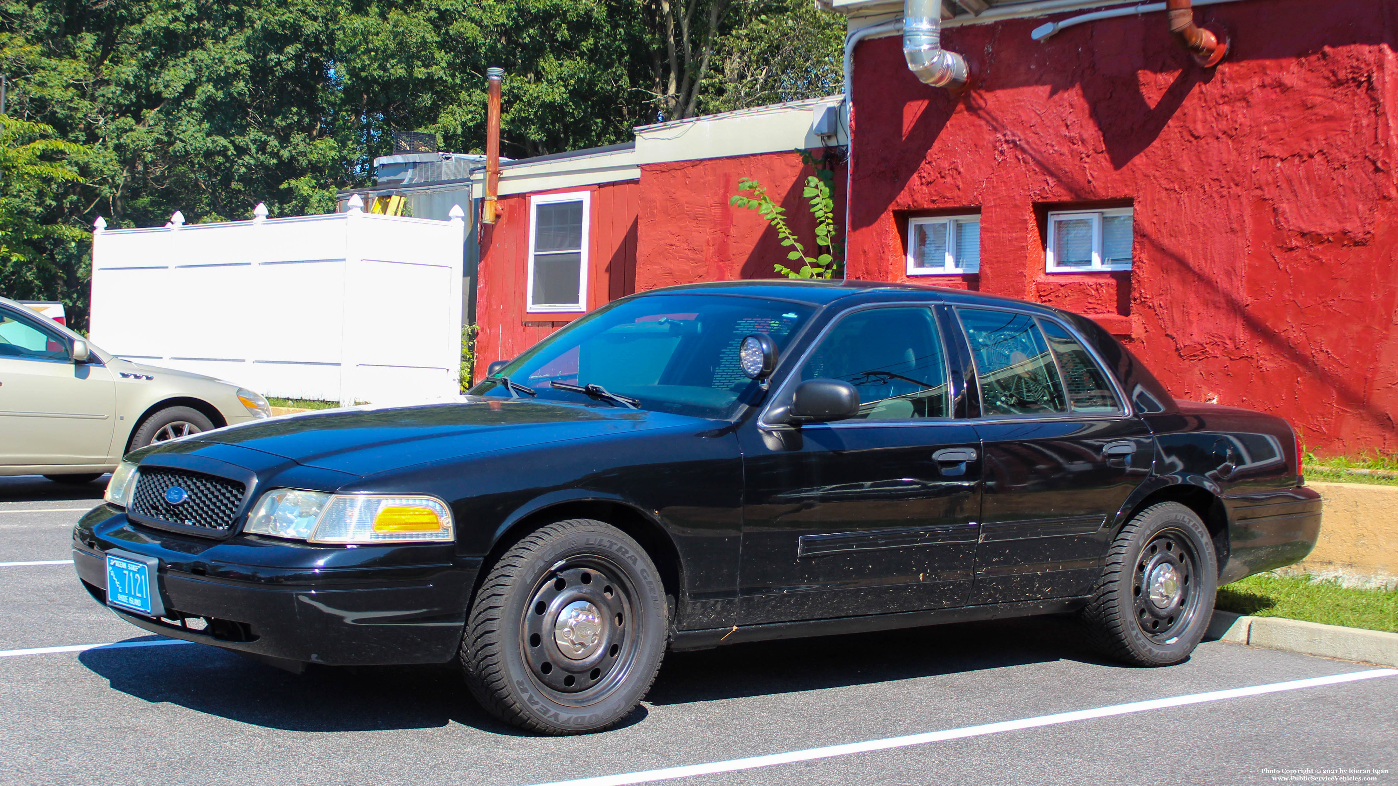 A photo  of University of Rhode Island Police
            Spare K-9 Unit, a 2009-2011 Ford Crown Victoria Police Interceptor             taken by Kieran Egan