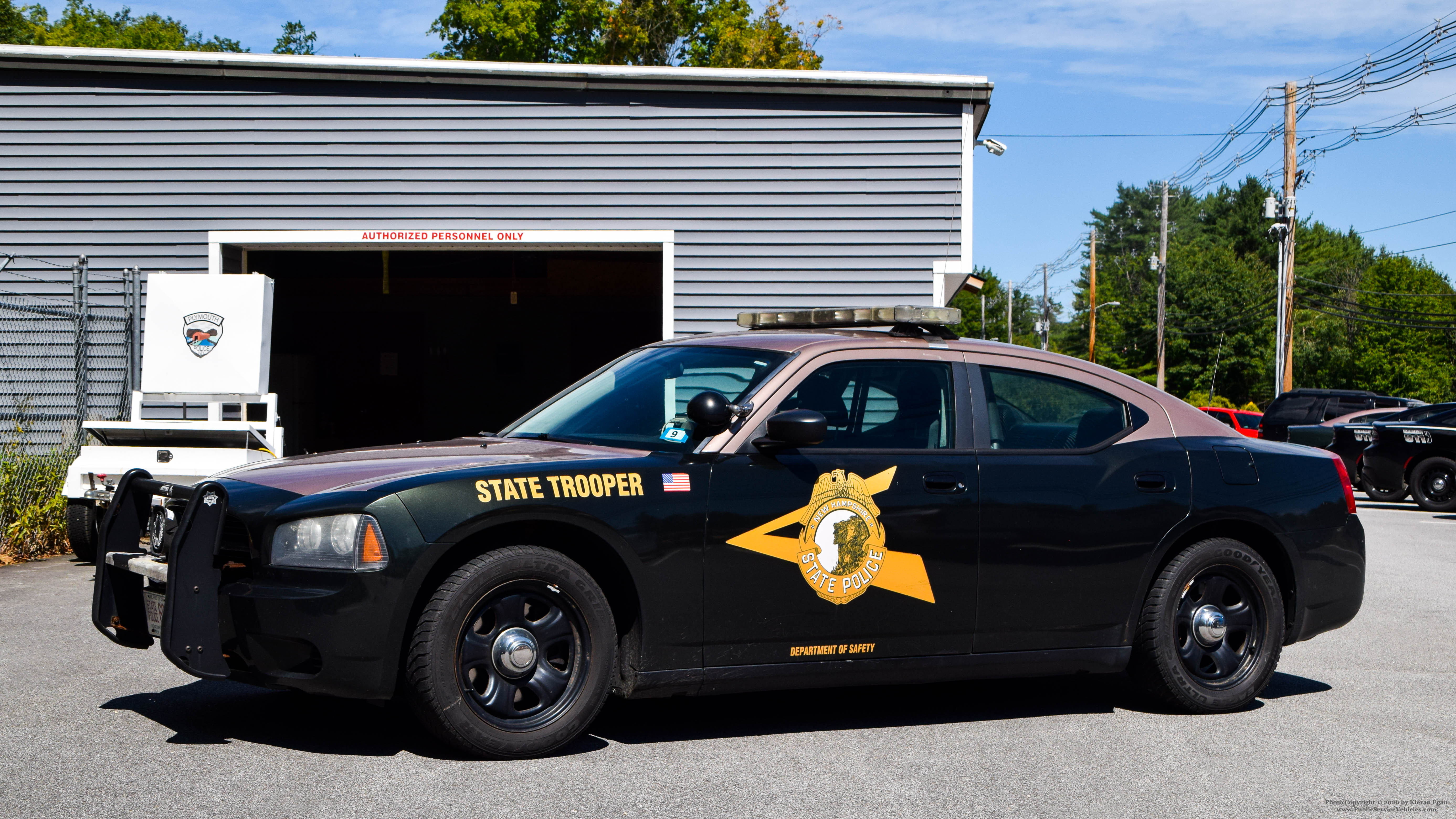 A photo  of New Hampshire State Police
            Cruiser 698, a 2006-2010 Dodge Charger             taken by Kieran Egan