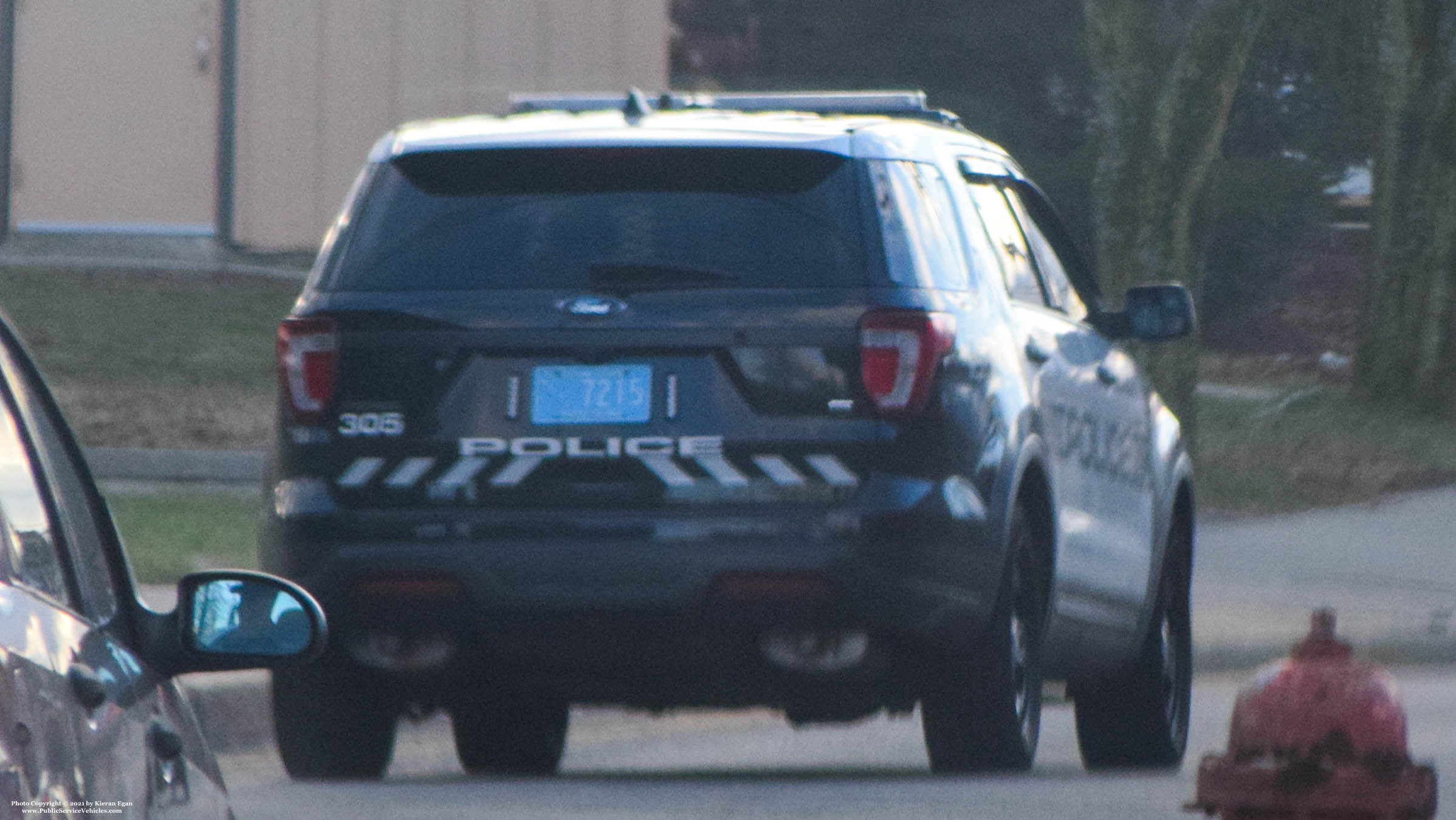 A photo  of Woonsocket Police
            Cruiser 305, a 2016-2019 Ford Police Interceptor Utility             taken by Kieran Egan