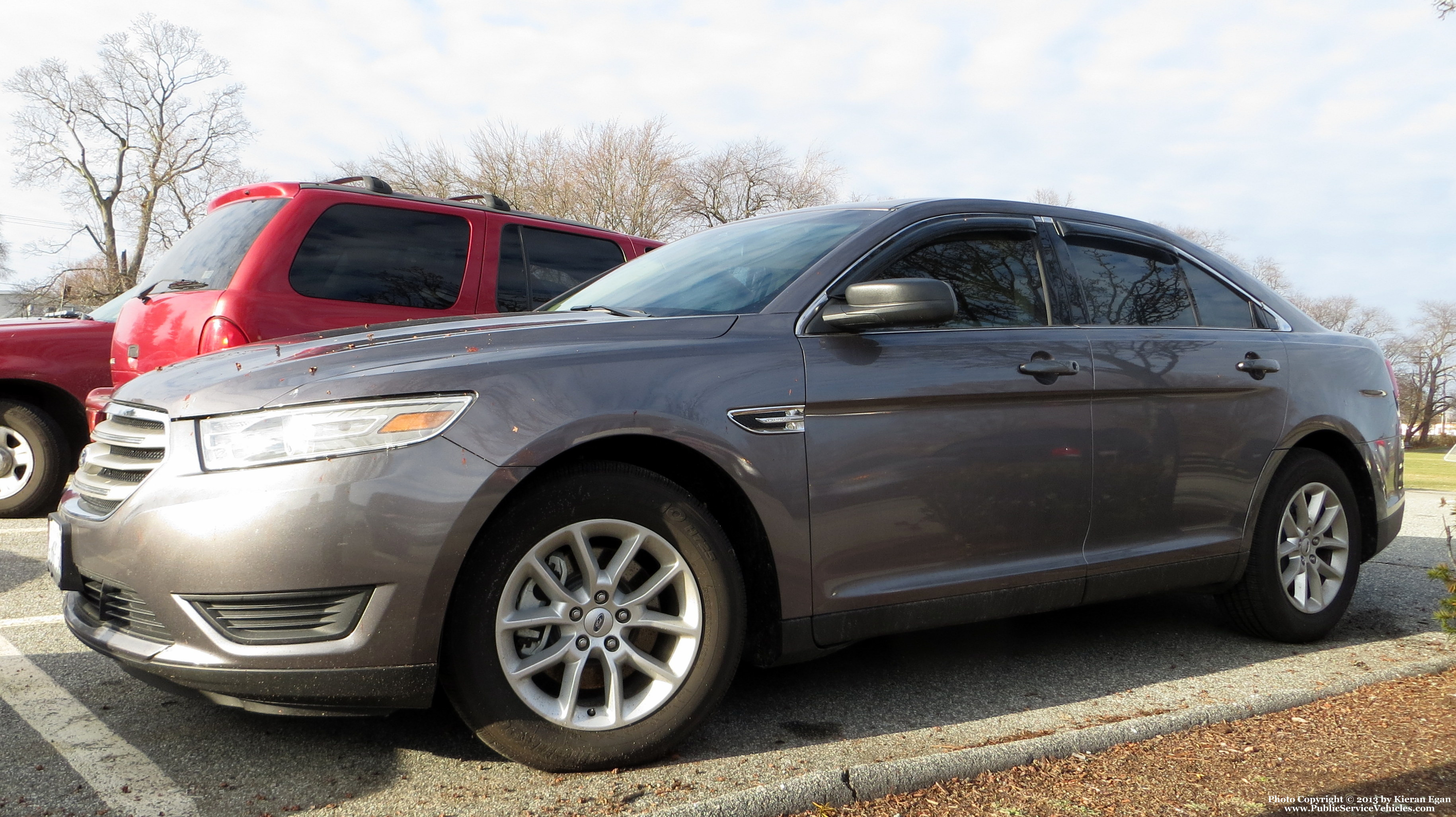 A photo  of East Providence Police
            Community Policing Unit, a 2013 Ford Taurus             taken by Kieran Egan