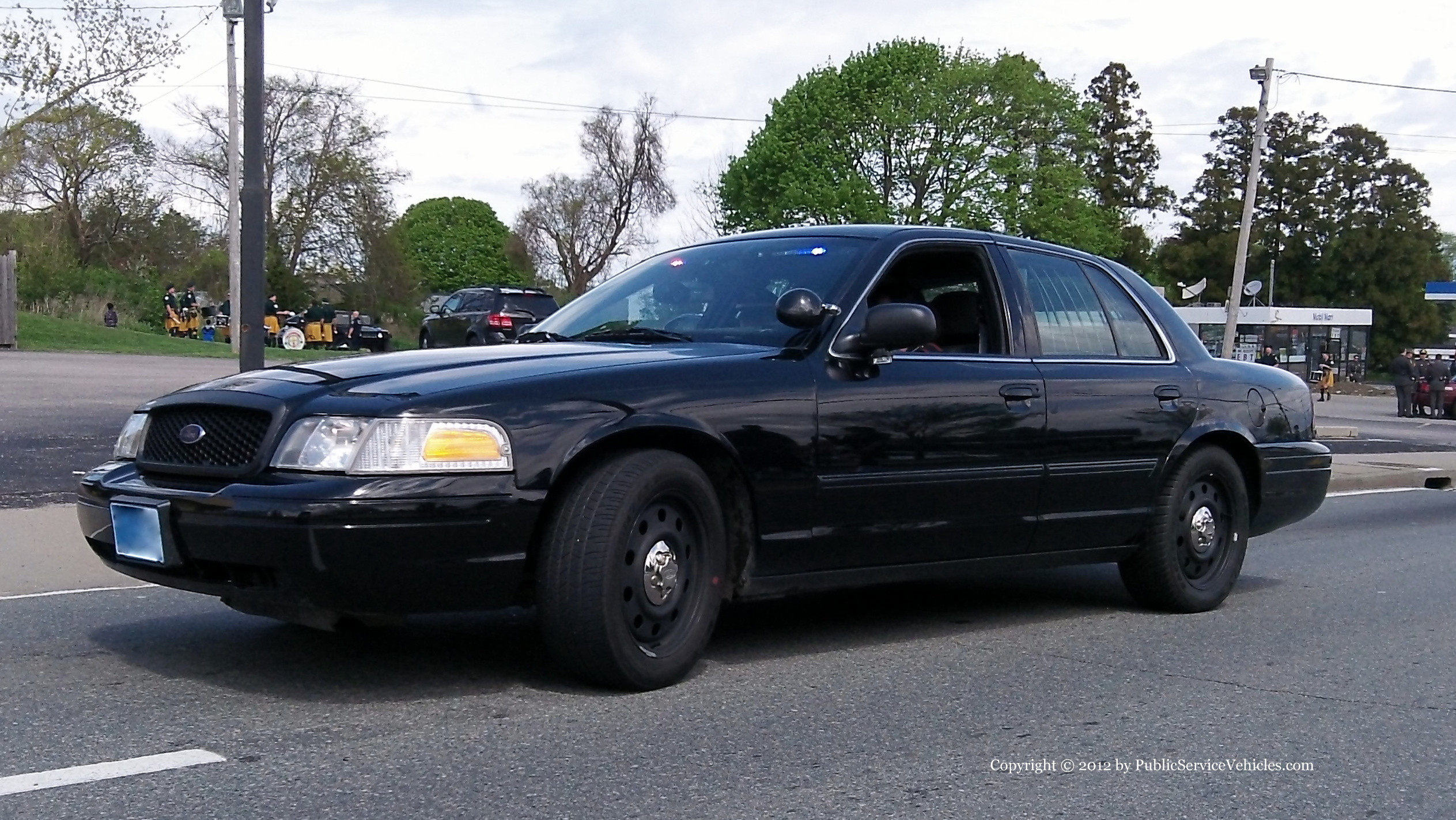 A photo  of Portsmouth Police
            Car 4, a 2011 Ford Crown Victoria Police Interceptor             taken by Kieran Egan