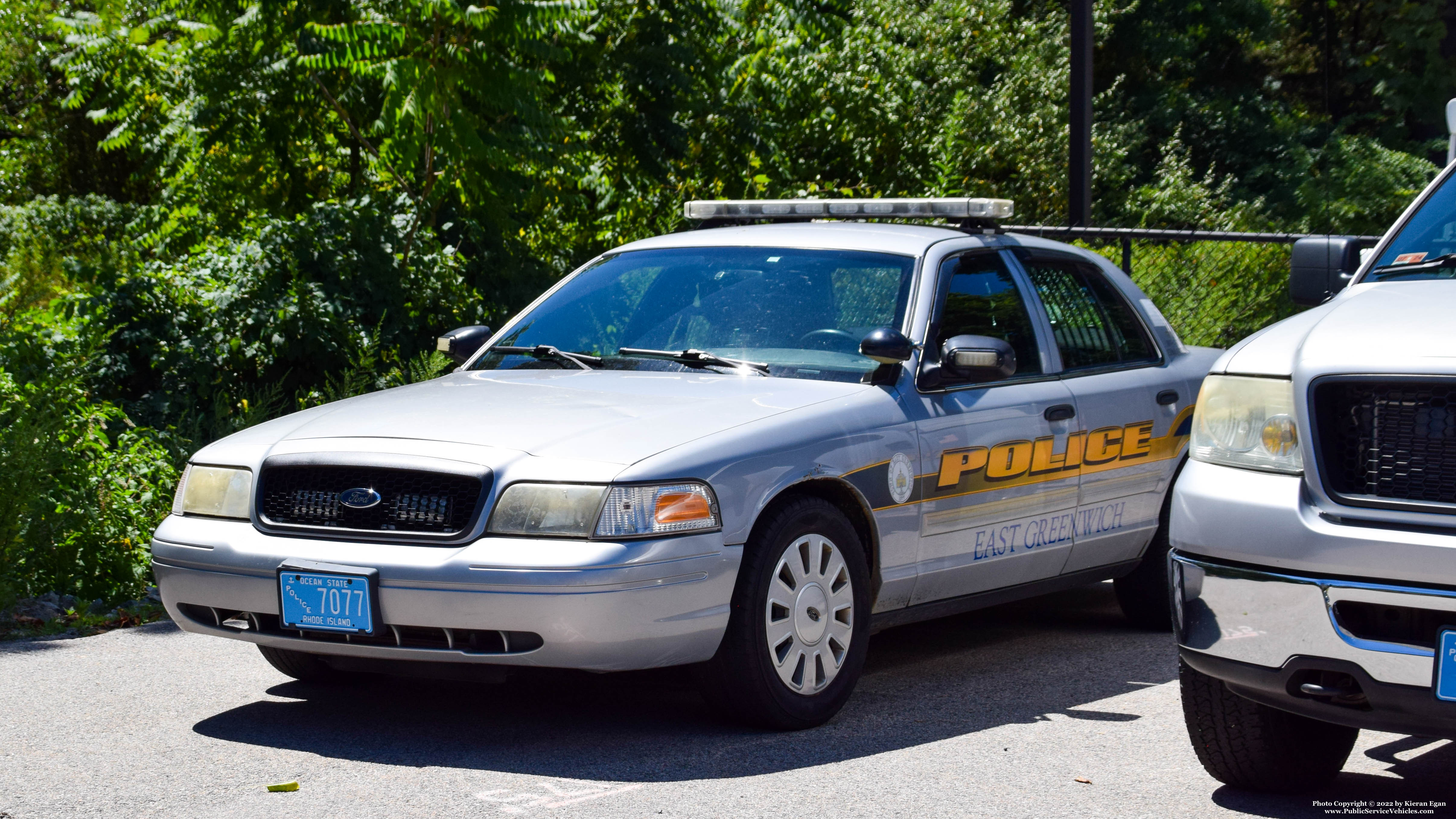 A photo  of East Greenwich Police
            Cruiser 7077, a 2009-2011 Ford Crown Victoria Police Interceptor/2009-2011 Ford Crown Victoria Police Interceptor             taken by Kieran Egan