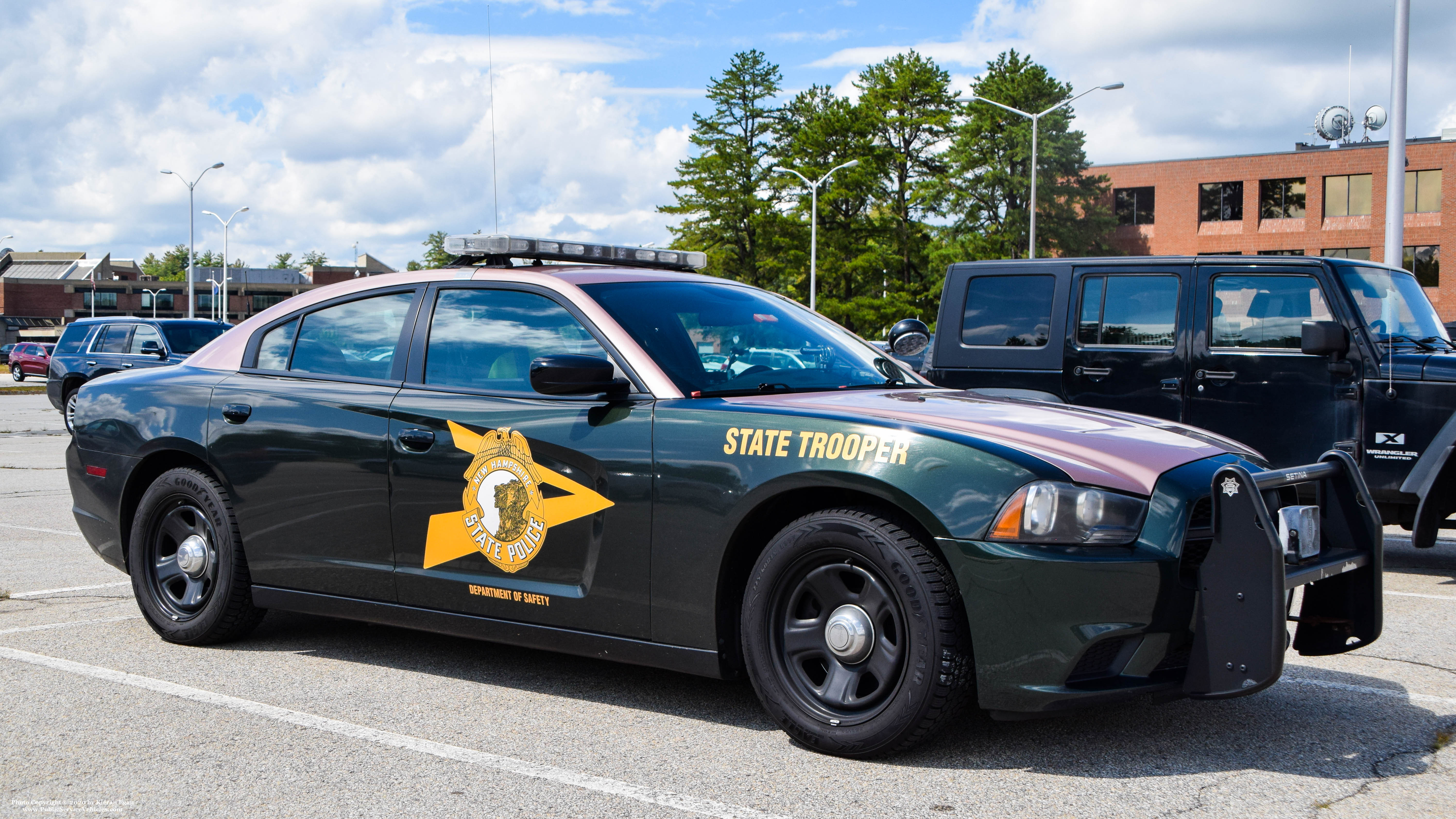 A photo  of New Hampshire State Police
            Cruiser 813, a 2011-2014 Dodge Charger             taken by Kieran Egan