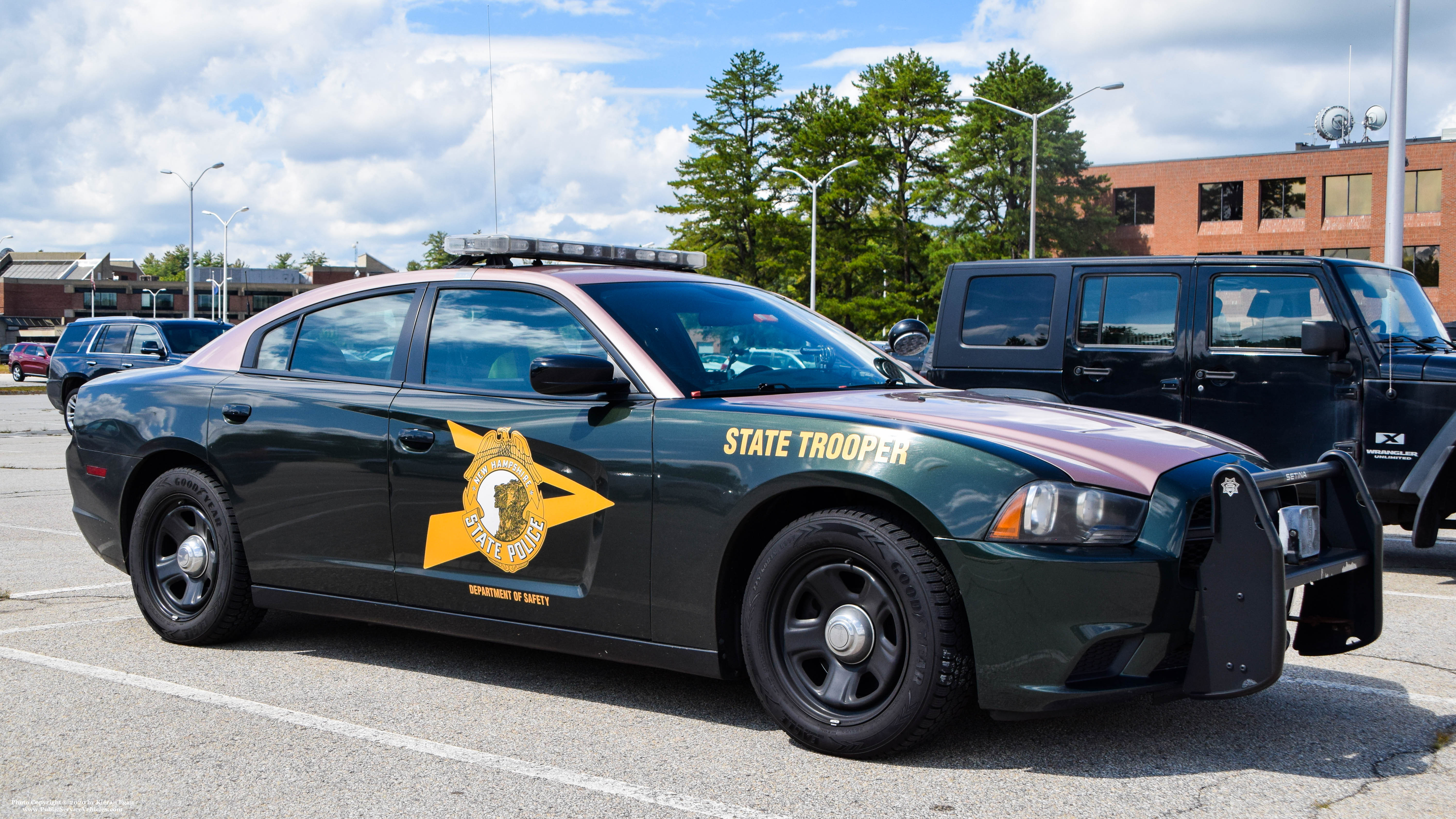 A photo  of New Hampshire State Police
            Cruiser 813, a 2011-2014 Dodge Charger             taken by Kieran Egan