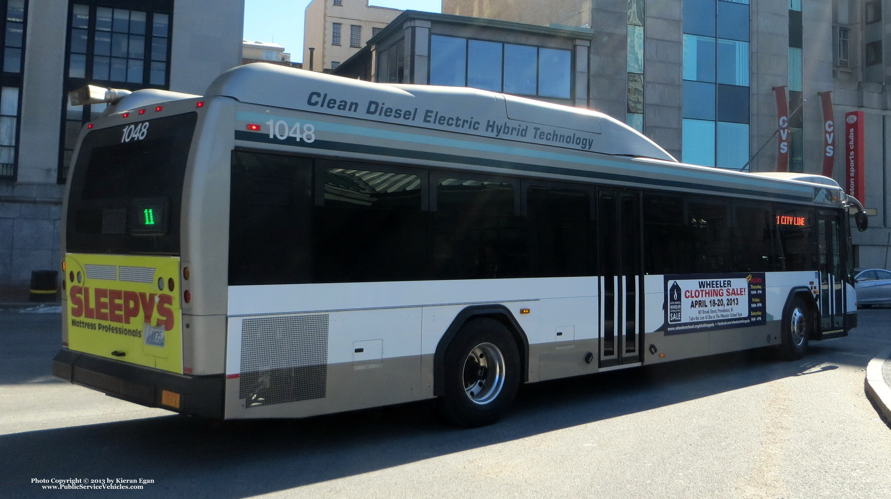 A photo  of Rhode Island Public Transit Authority
            Bus 1048, a 2010 Gillig BRT HEV             taken by Kieran Egan