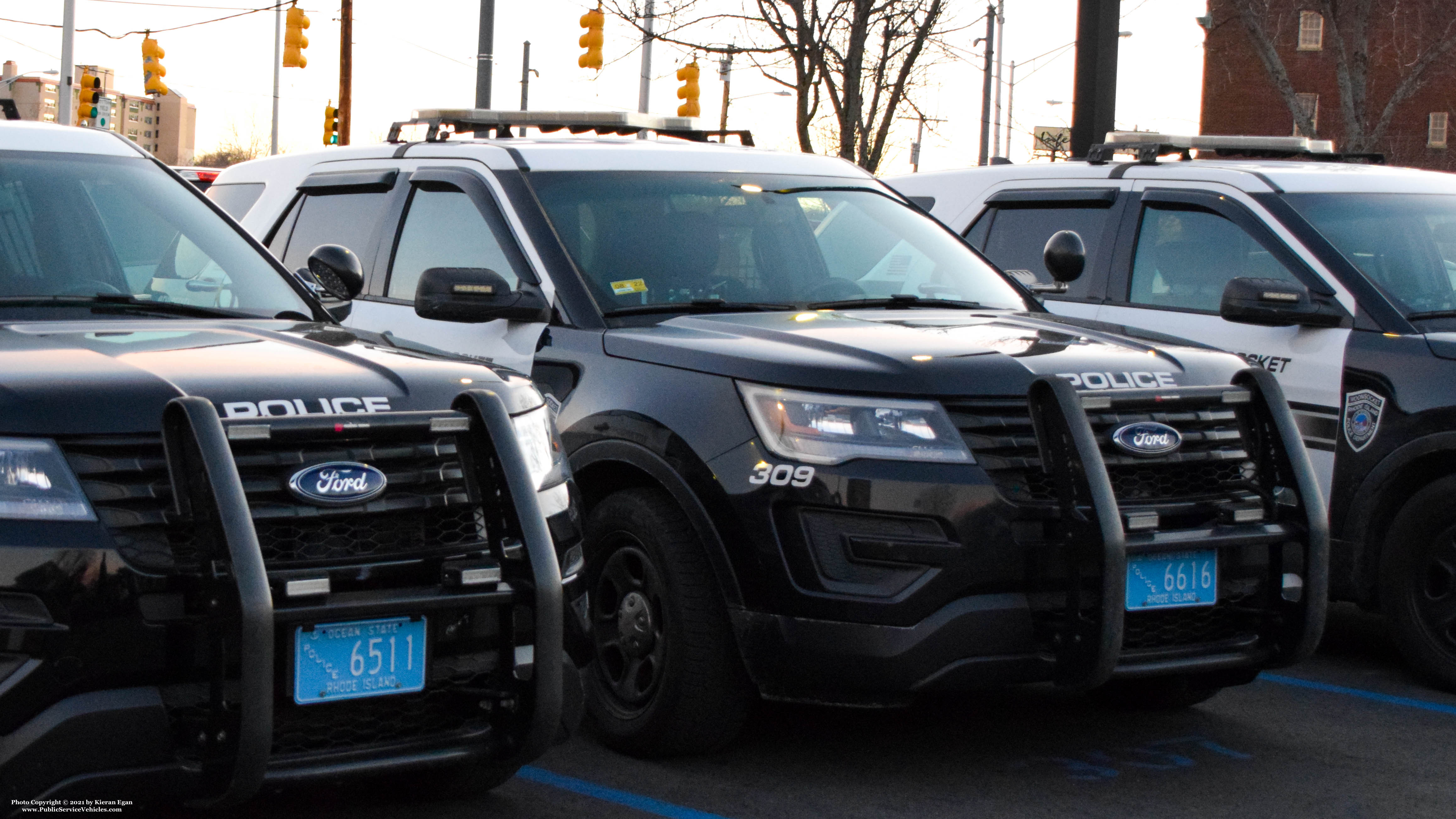 A photo  of Woonsocket Police
            Cruiser 309, a 2016-2018 Ford Police Interceptor Utility             taken by Kieran Egan