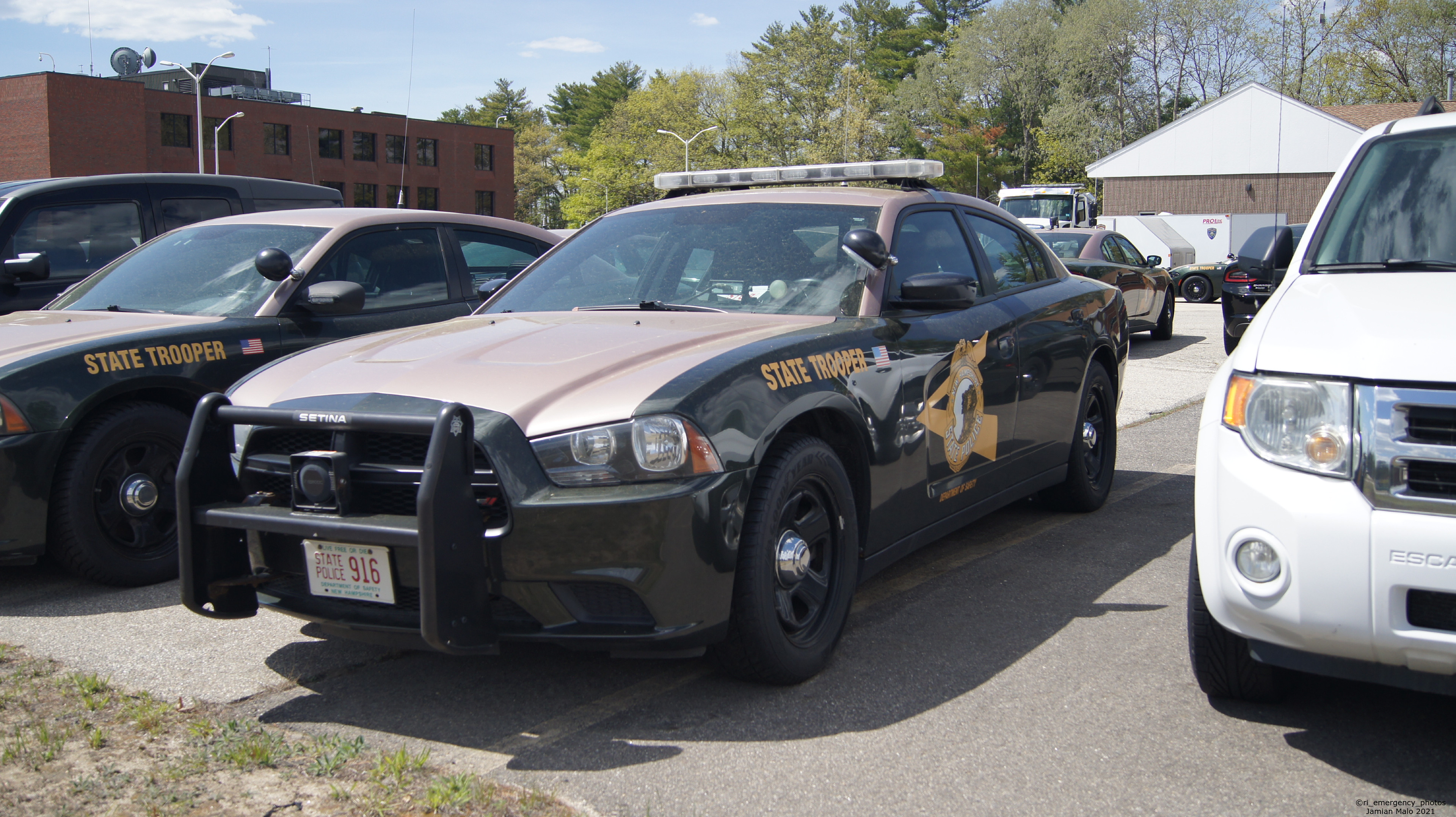 A photo  of New Hampshire State Police
            Cruiser 916, a 2011-2014 Dodge Charger             taken by Jamian Malo