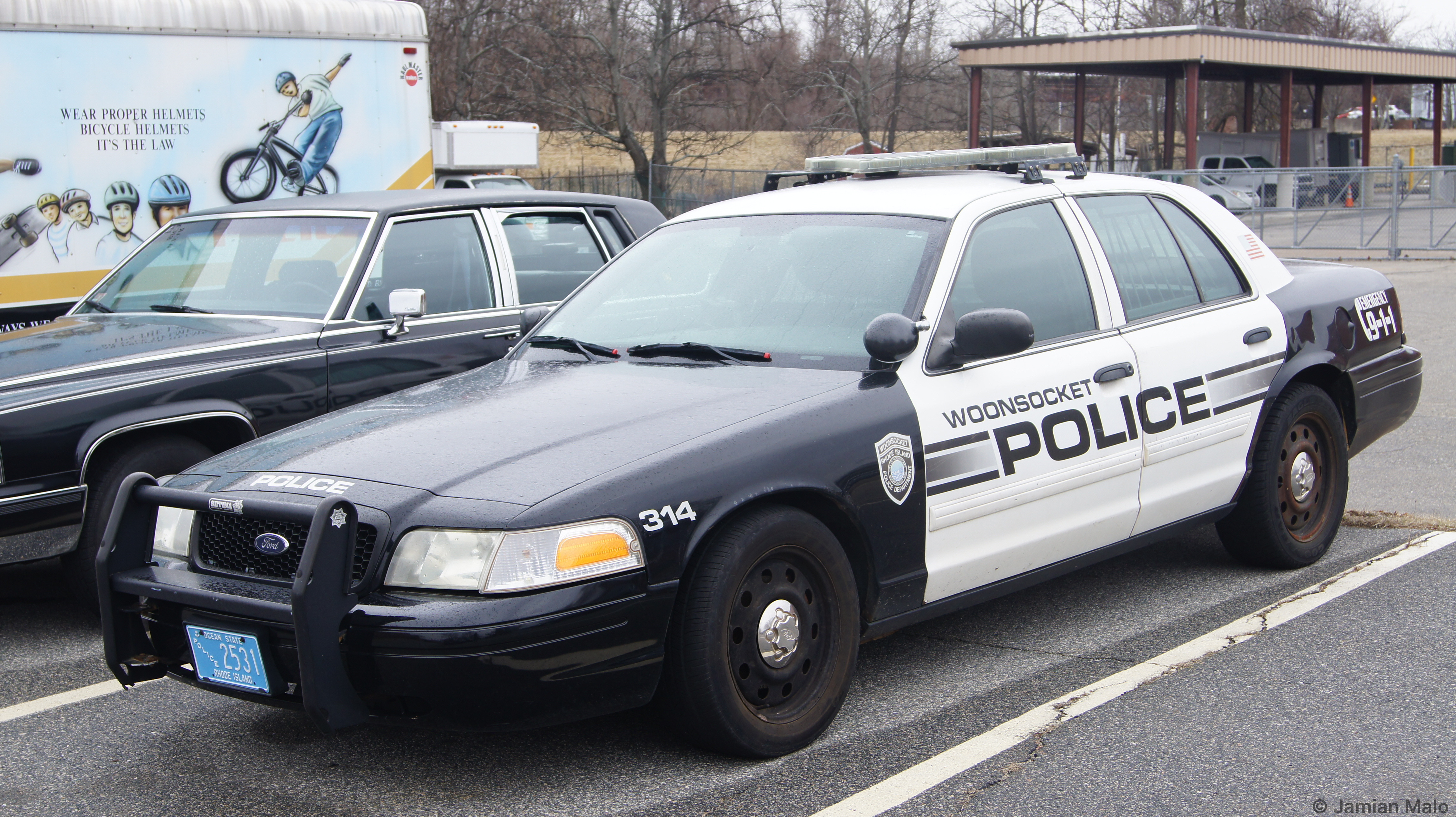 A photo  of Woonsocket Police
            Cruiser 314, a 2009-2011 Ford Crown Victoria Police Interceptor             taken by Jamian Malo