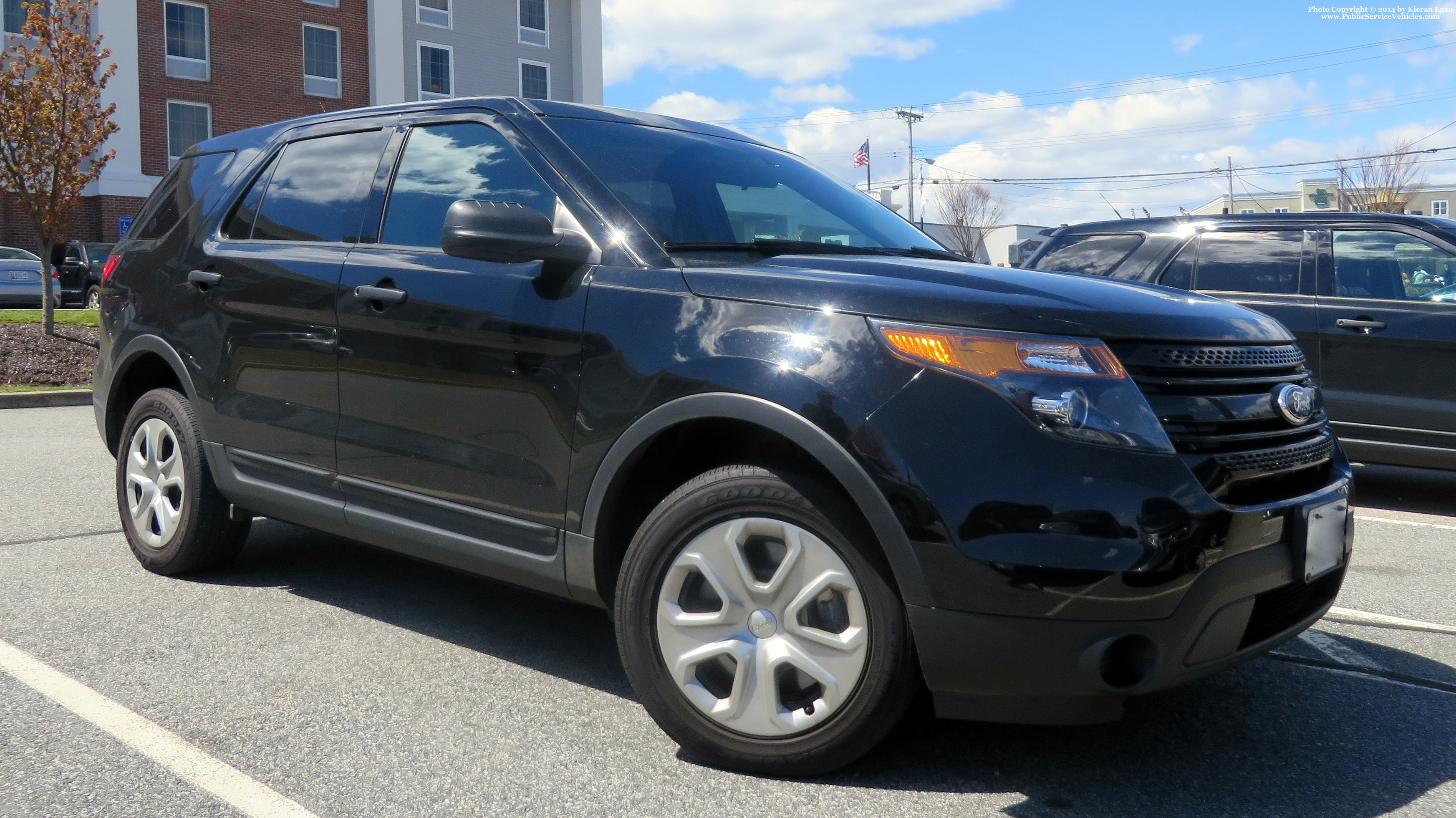 A photo  of Rhode Island State Police
            Unmarked Unit, a 2013-2015 Ford Police Interceptor Utility             taken by Kieran Egan